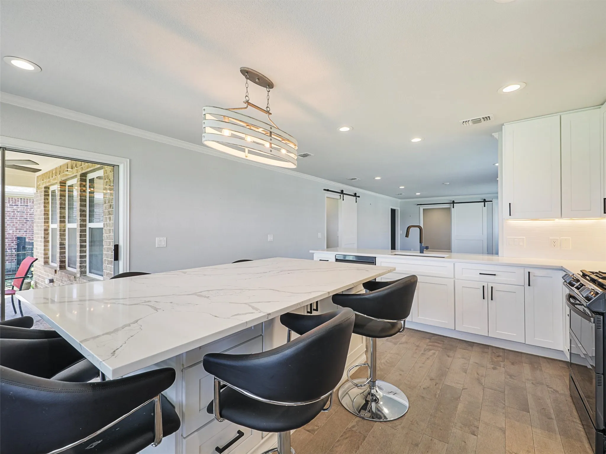 Kitchen has plenty of storage underneath Kitchen Island. Kitchen Island a great place to play games too!