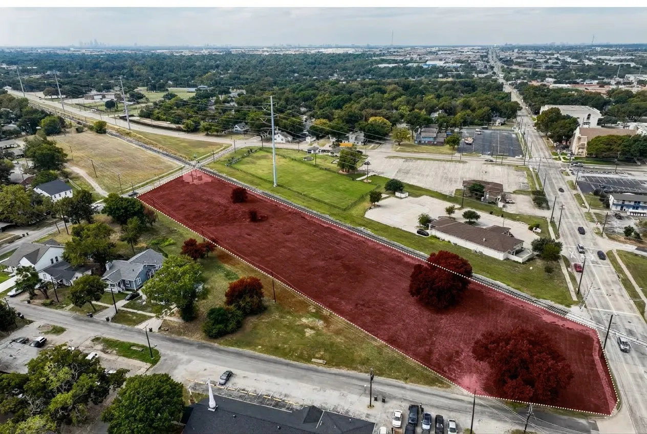 Expansive parcel with clear boundaries, bordered by established roads and mature trees