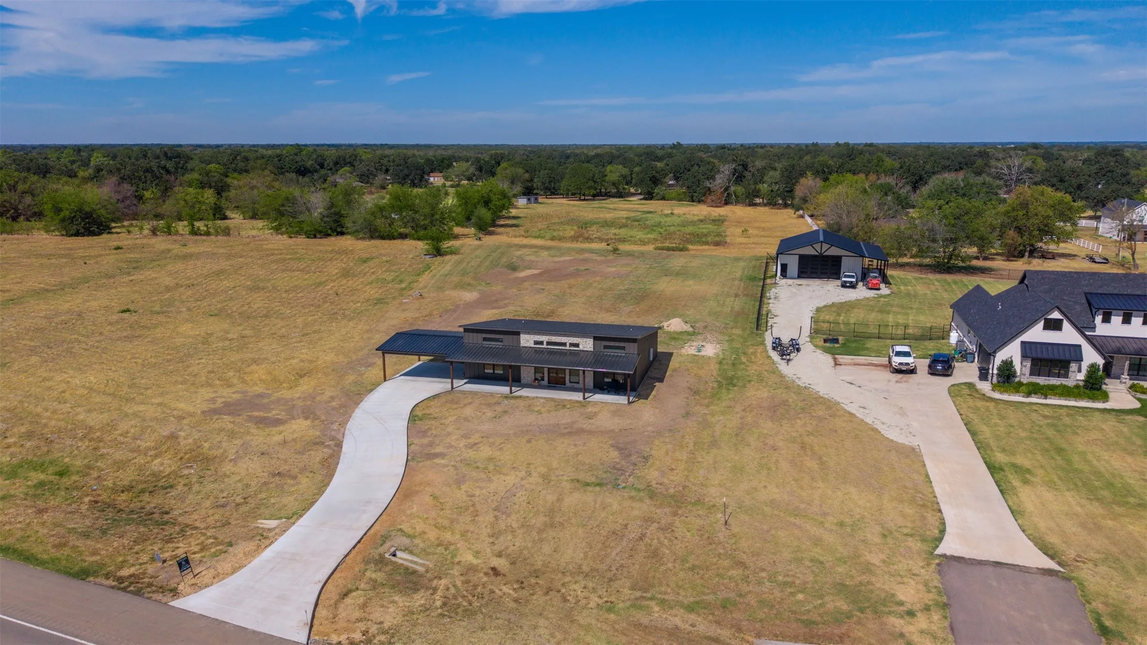 Contemporary-style residence with a dark facade and light trim