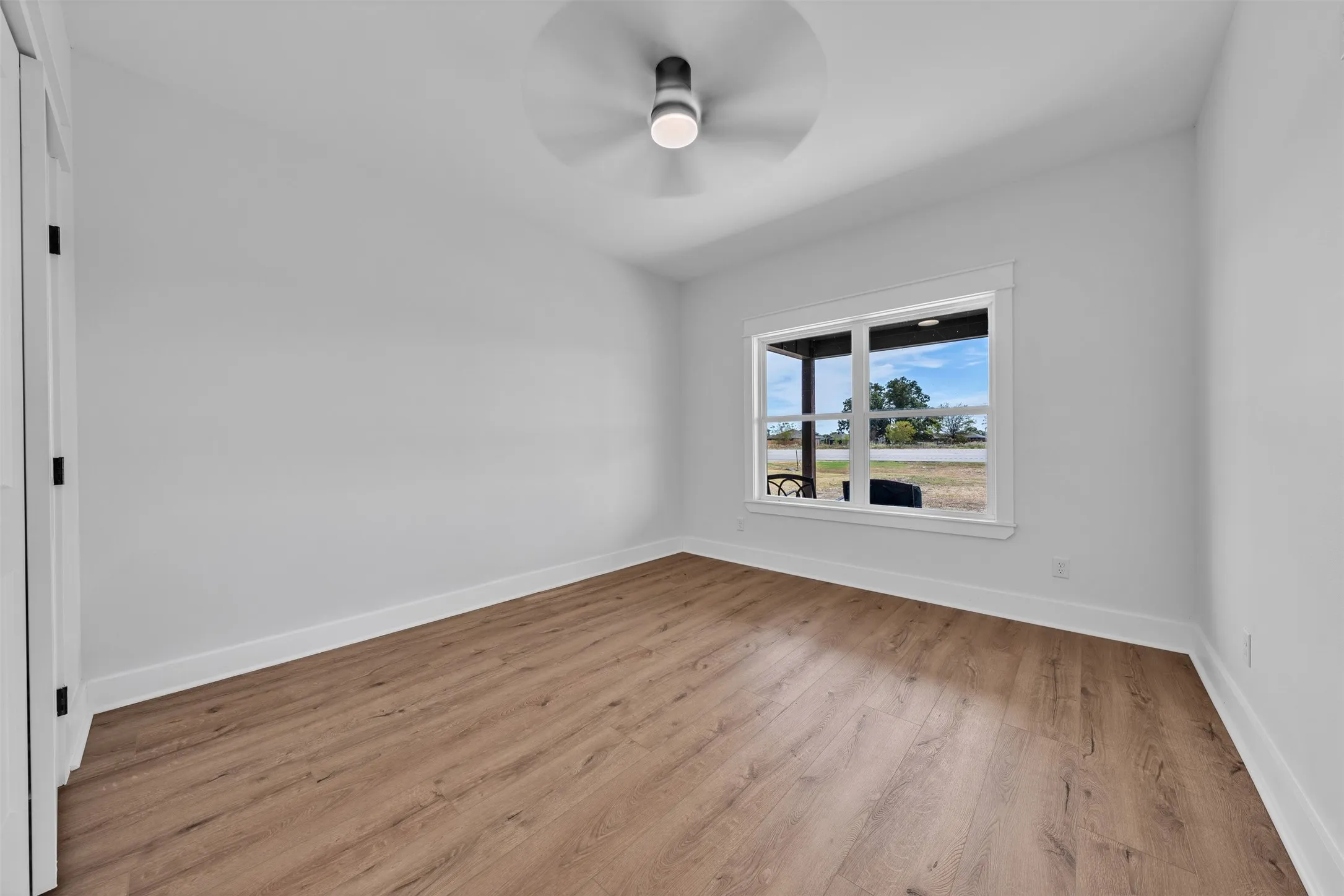 Wood-finish flooring with white trim