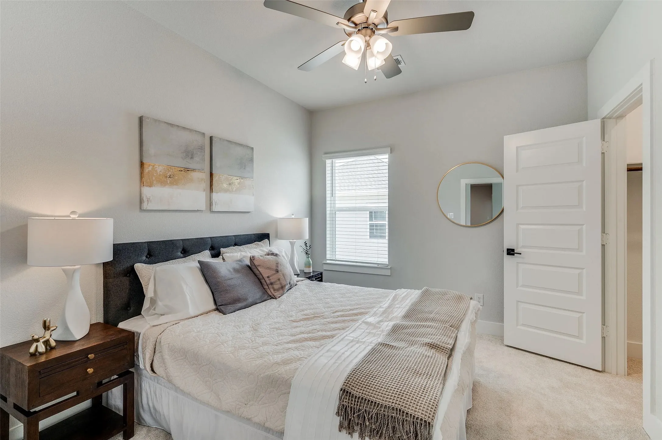 Recessed lighting, ceiling fan with integrated lighting, window with blinds, paneled interior door, and light-toned carpet flooring