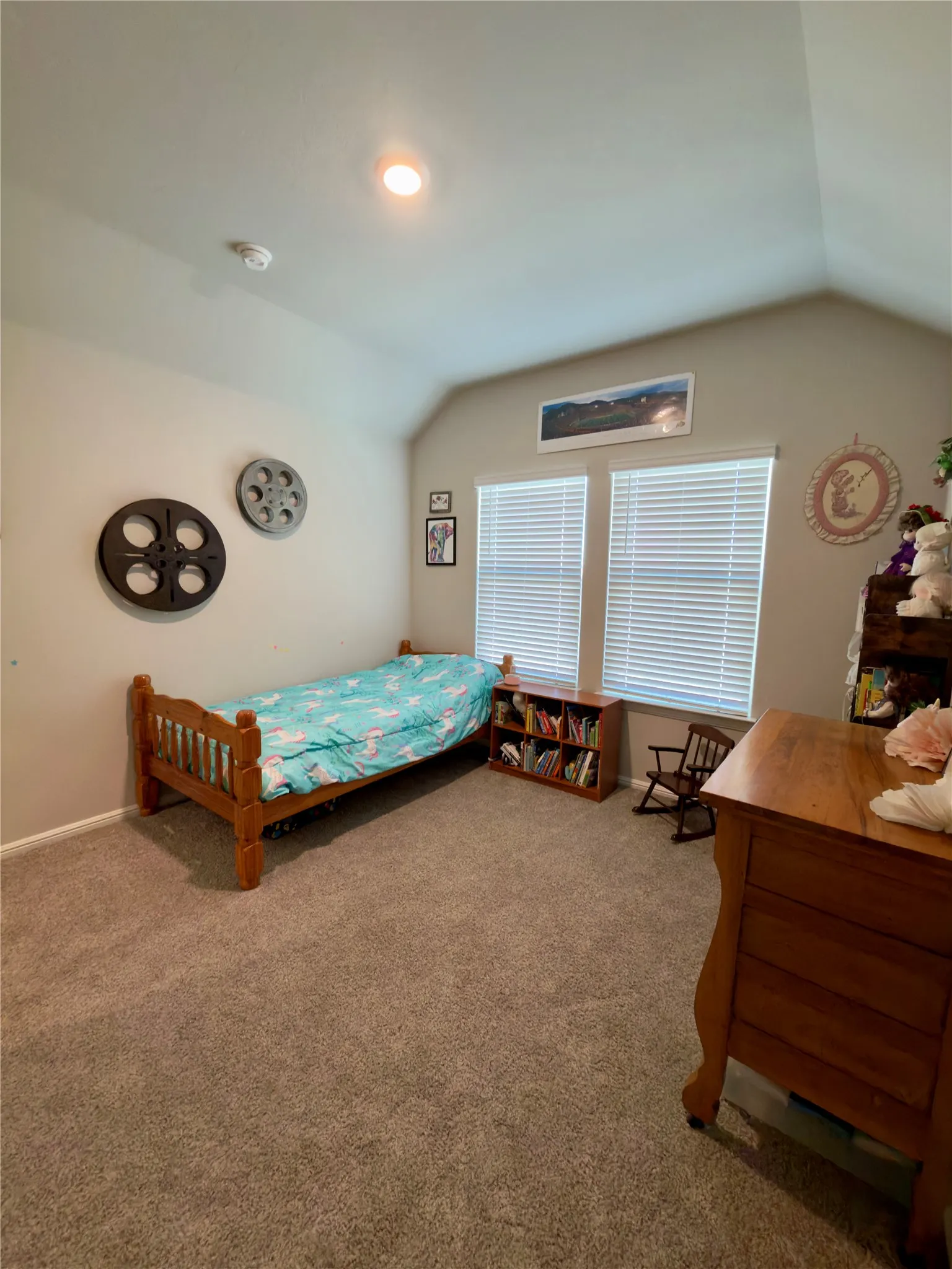 Bedroom with carpet and baseboards