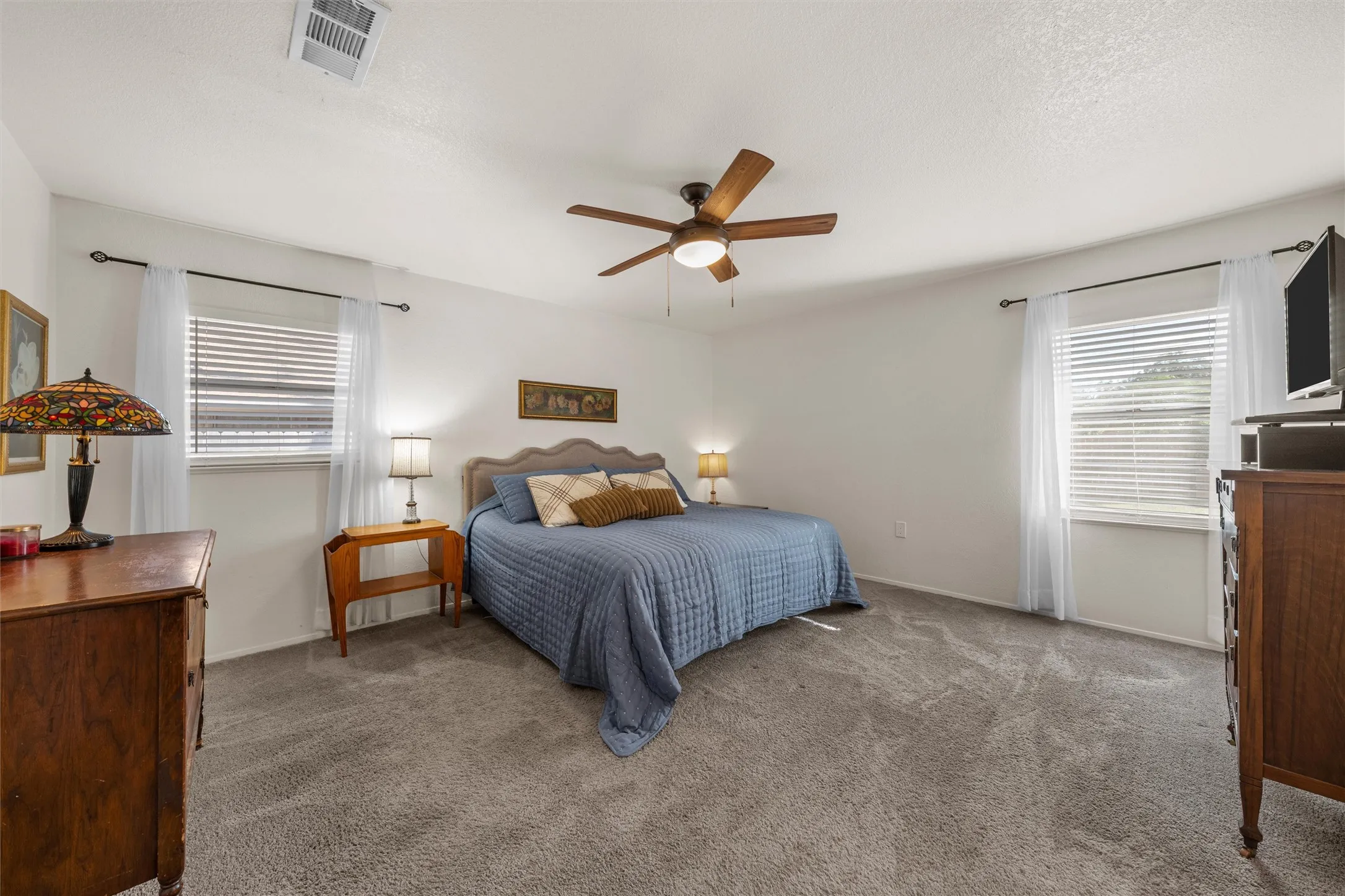 Neutral wall tones with installed ceiling fan