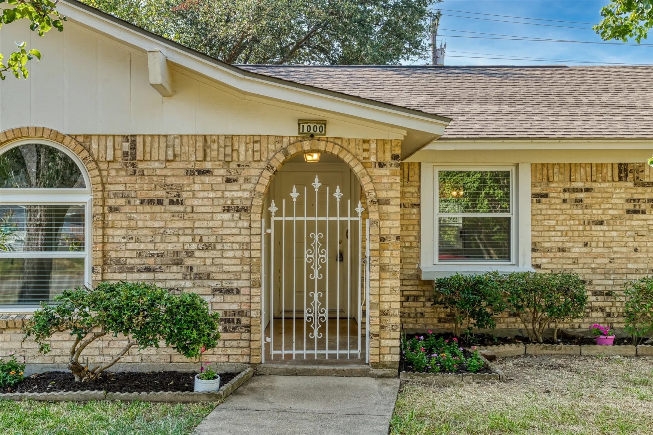 Don't wait--Make this charming home with a gated front entrance and double pane windows your new address!
