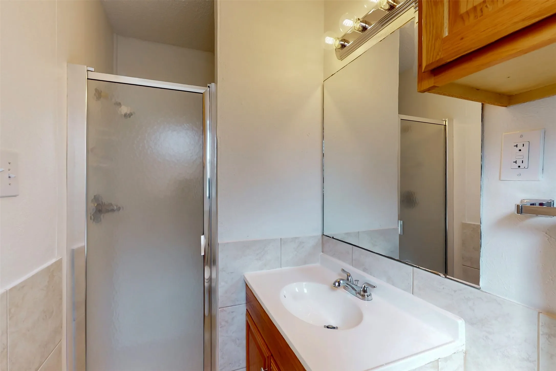 The walk-in shower is larger than a photo can show--a must see in person!