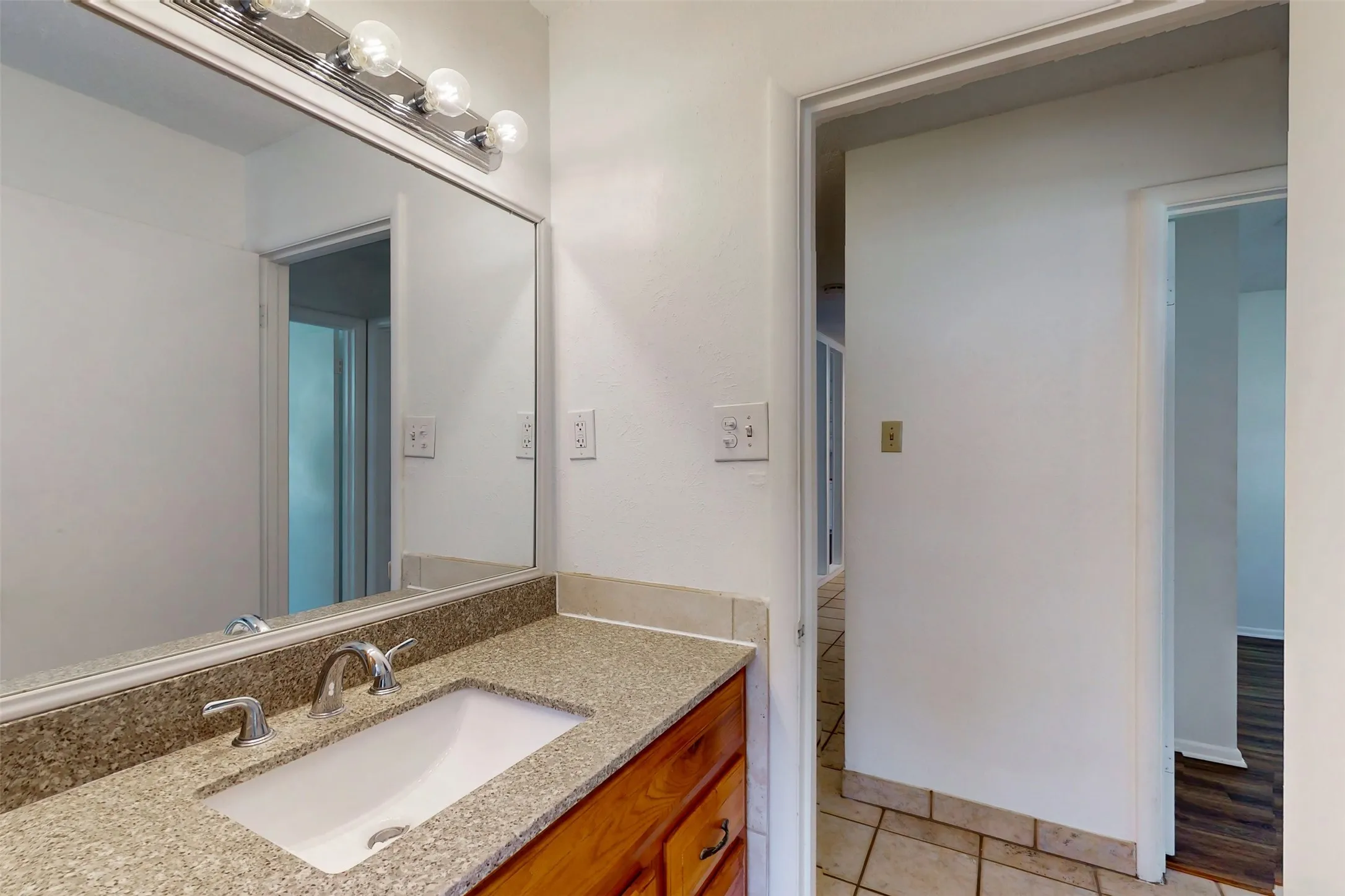 Granite countertop vanity.