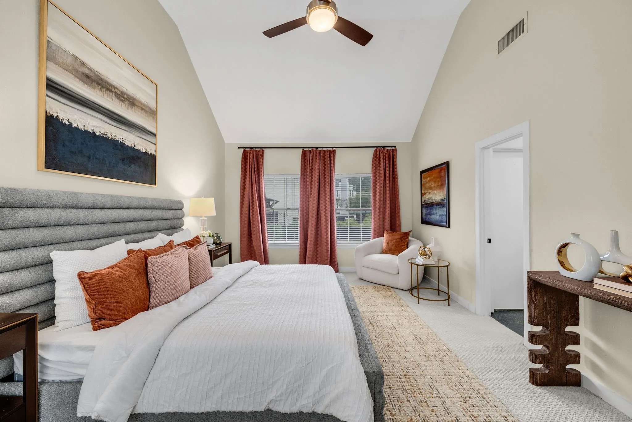 Primary suite features TWO separate bathrooms and TWO separate closets. Lots of windows on both sides!