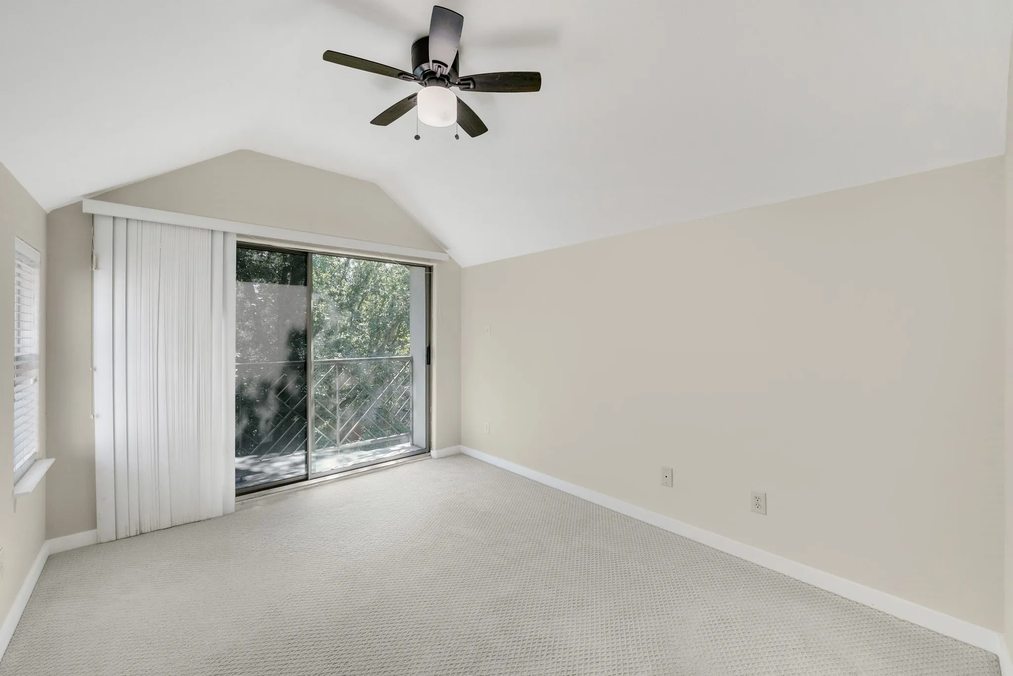 Third floor bedroom with treetop views would make excellent study, flex, home gym, playroom