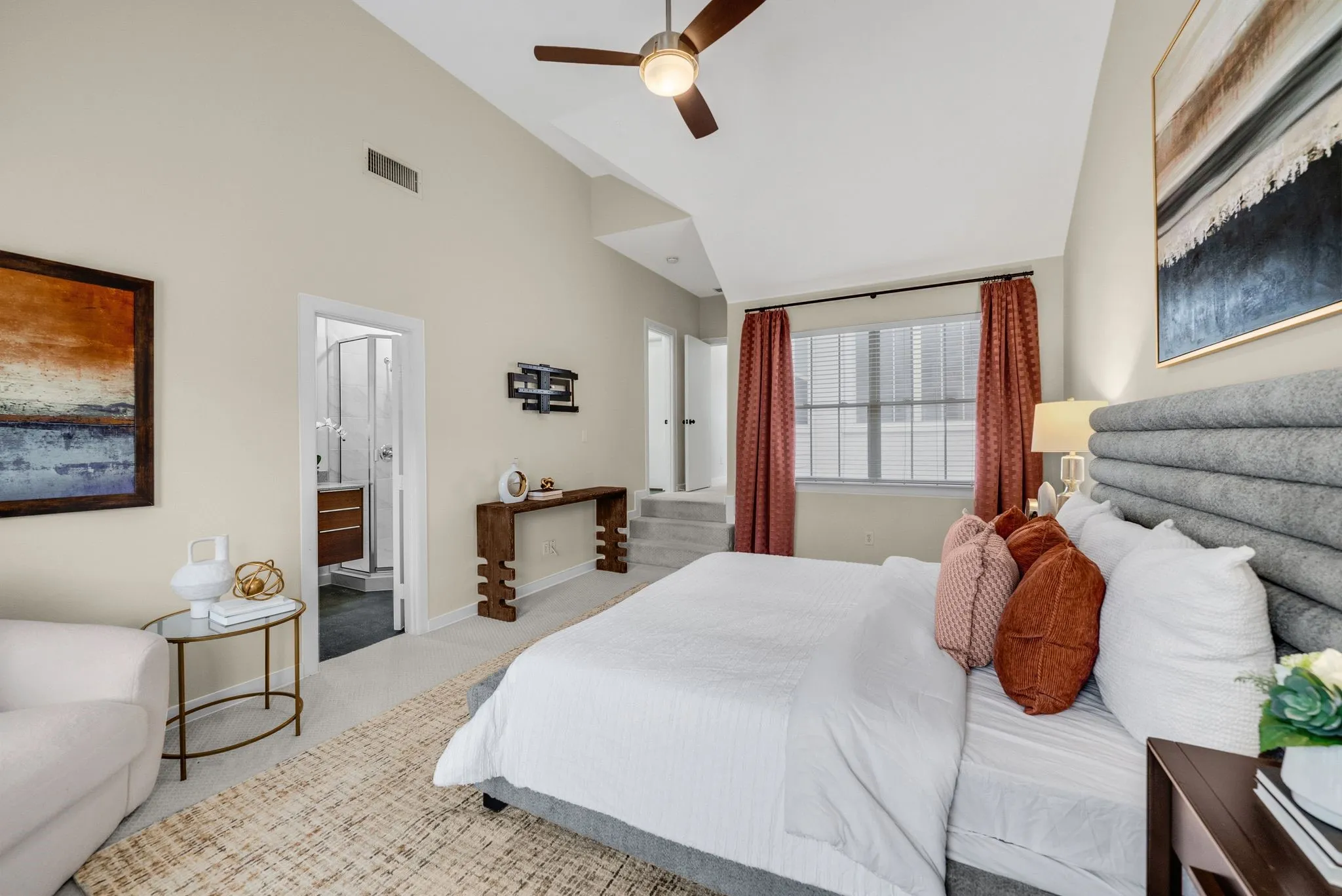 Primary suite features TWO separate bathrooms and TWO separate closets. Lots of windows on both sides!