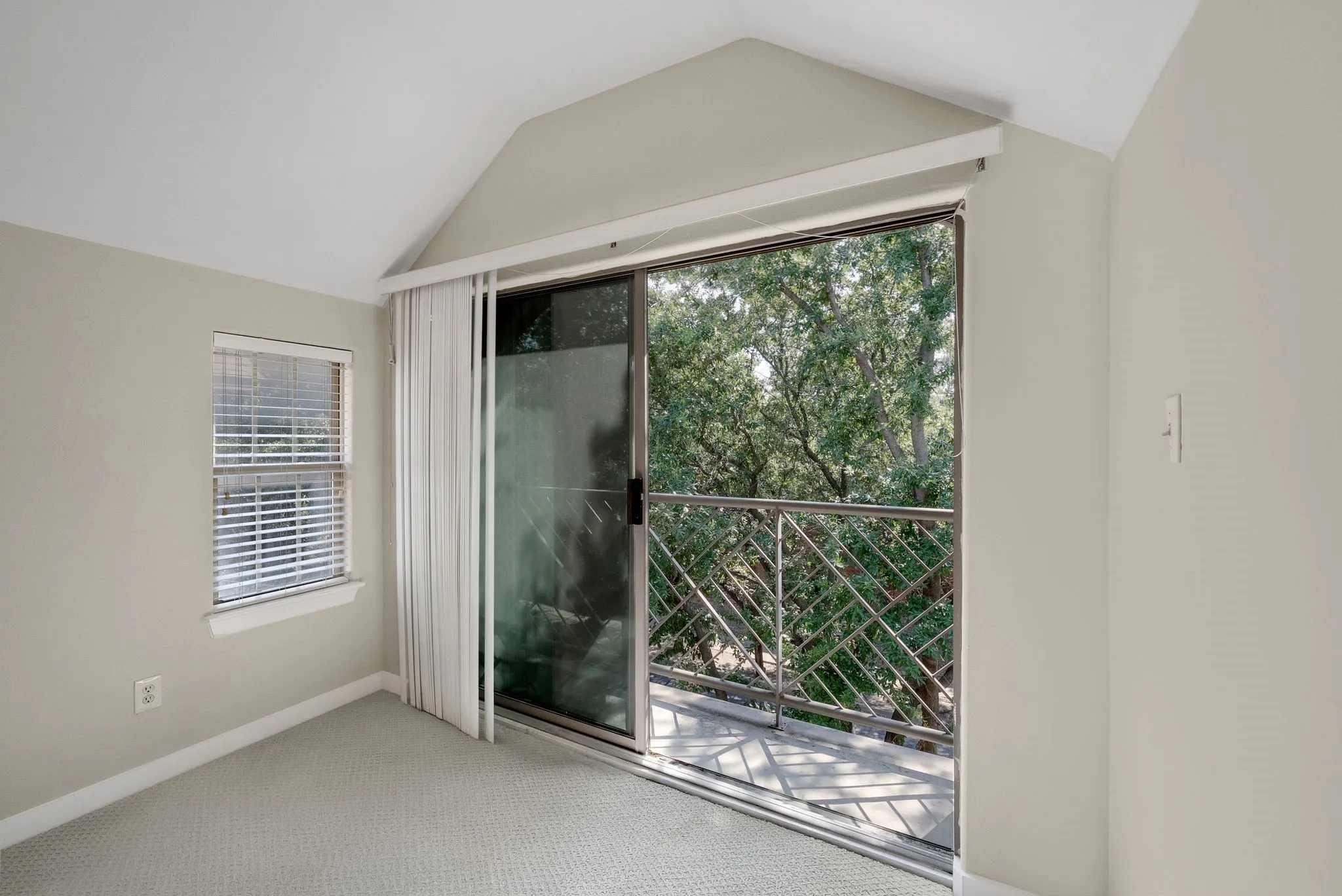 Third floor bedroom with treetop views would make excellent study, flex, home gym, playroom