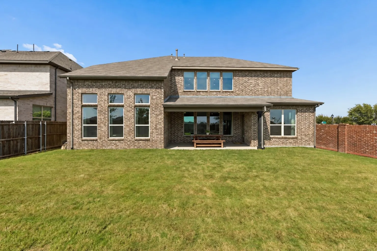 This fenced backyard delivers a wonderful combination of privacy, usable lawn space, mature trees, and outdoor versatility. The covered patio provides a comfortable vantage point overlooking the spacious grounds, creating an ideal setting for entertaining and everyday enjoyment.