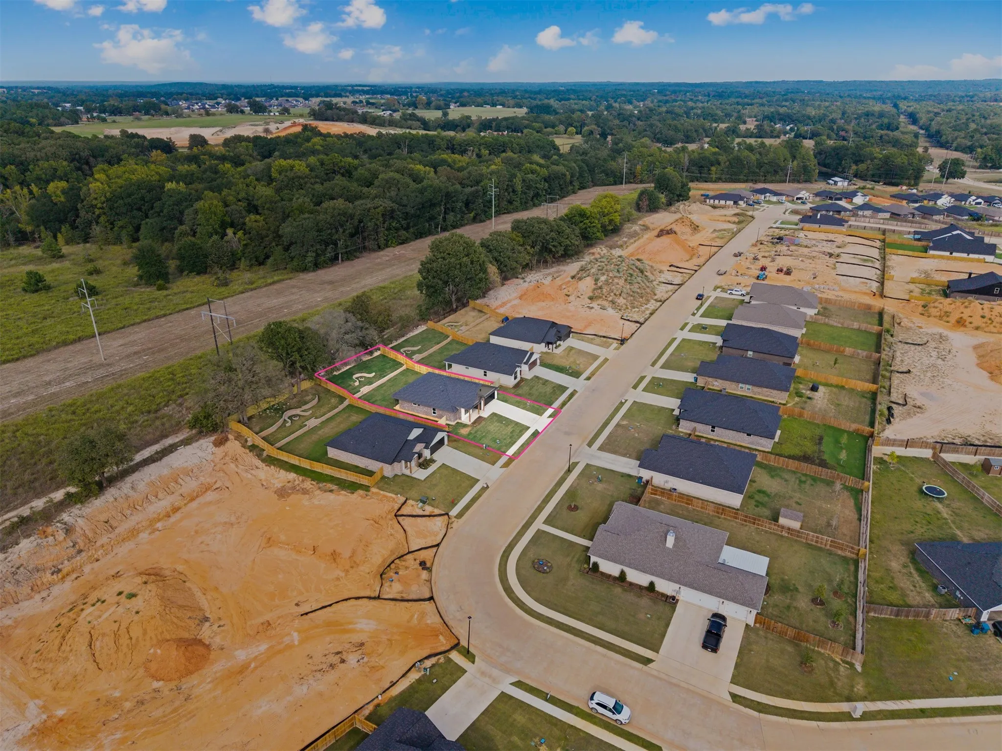 New construction residential development with paved streets and established homes