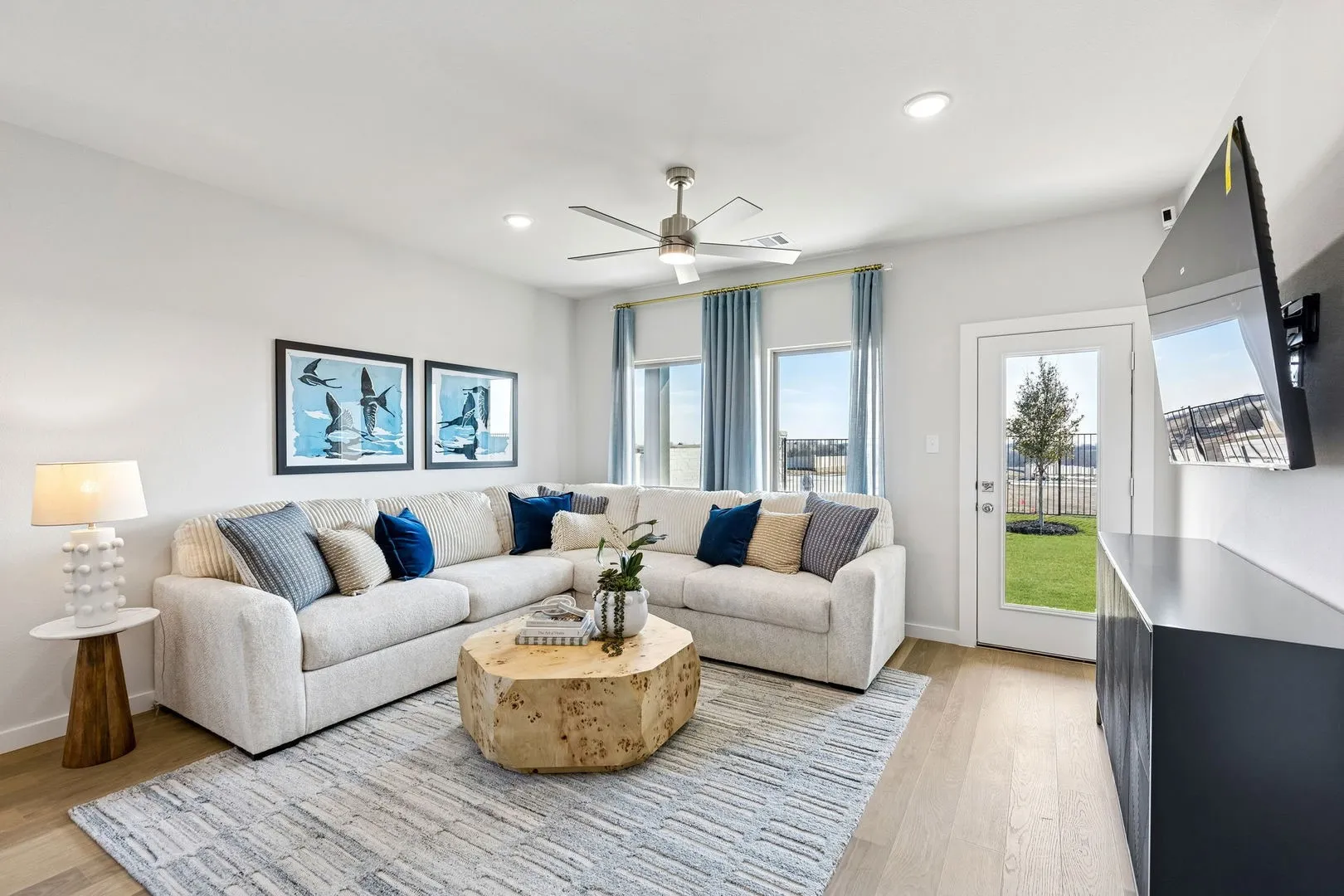 Living Room in the Magnolia home plan by Trophy Signature Homes – REPRESENTATIVE PHOTO