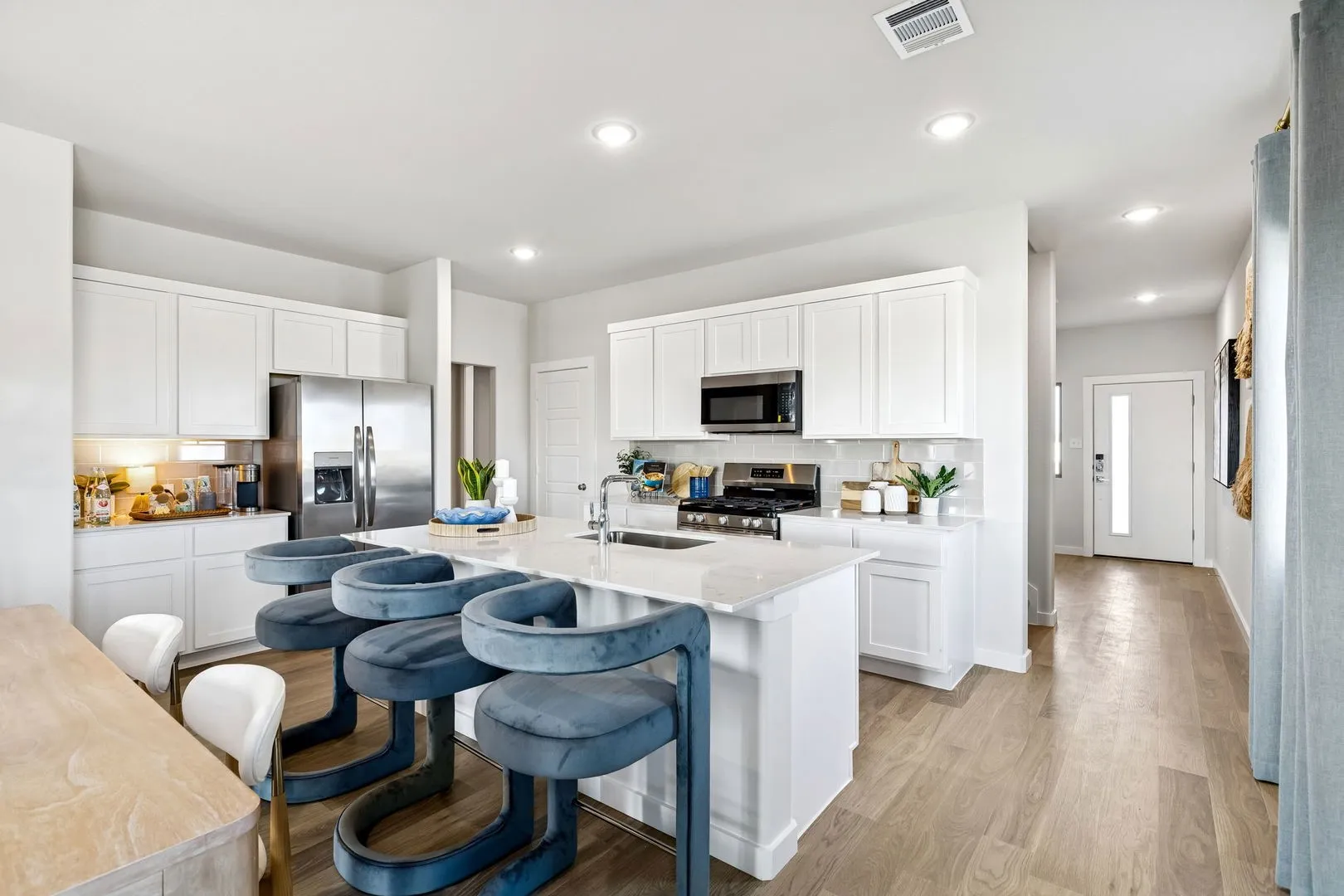 Kitchen in the Magnolia home plan by Trophy Signature Homes – REPRESENTATIVE PHOTO