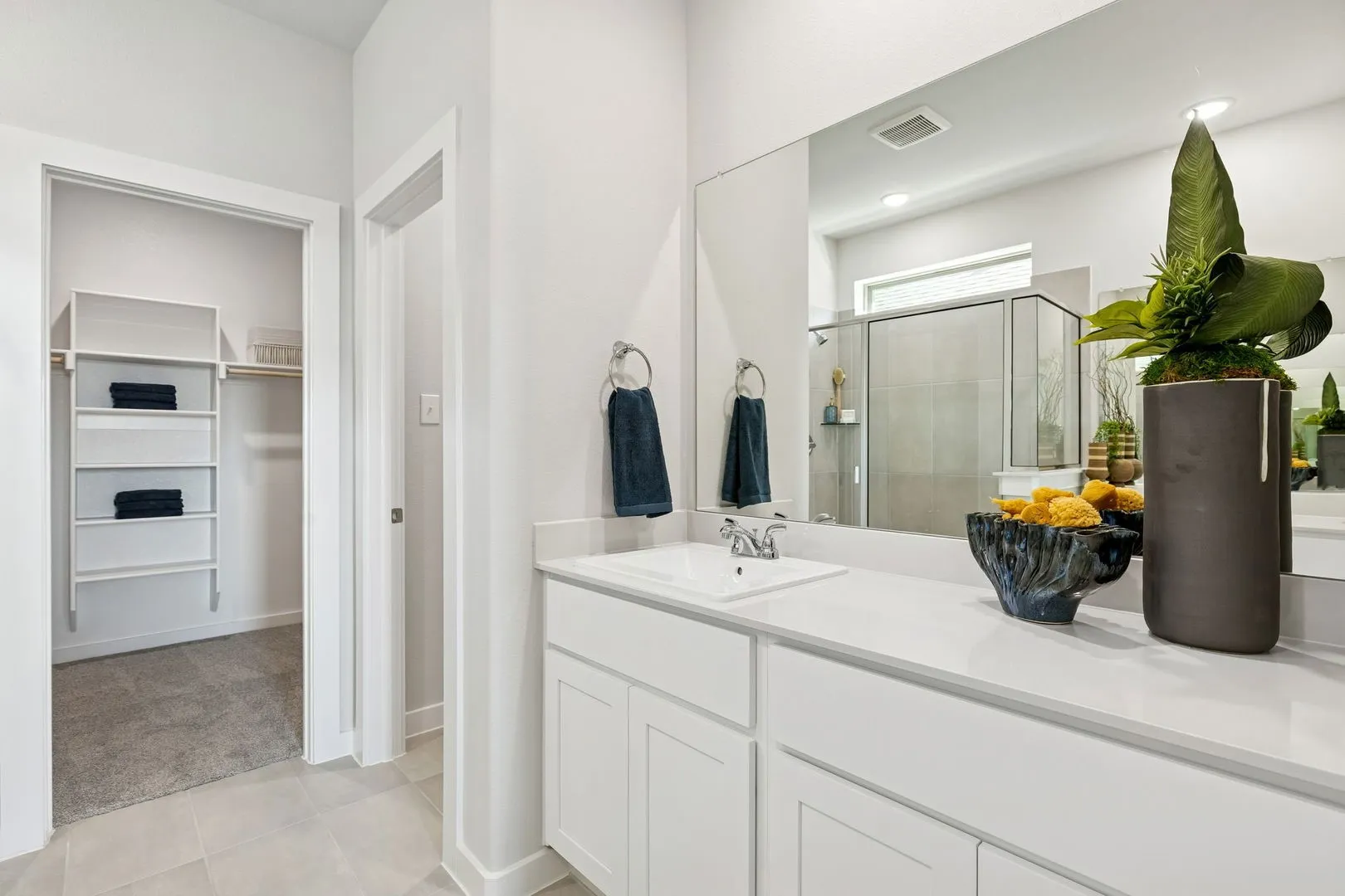 Primary bathroom in the Magnolia home plan by Trophy Signature Homes – REPRESENTATIVE PHOTO