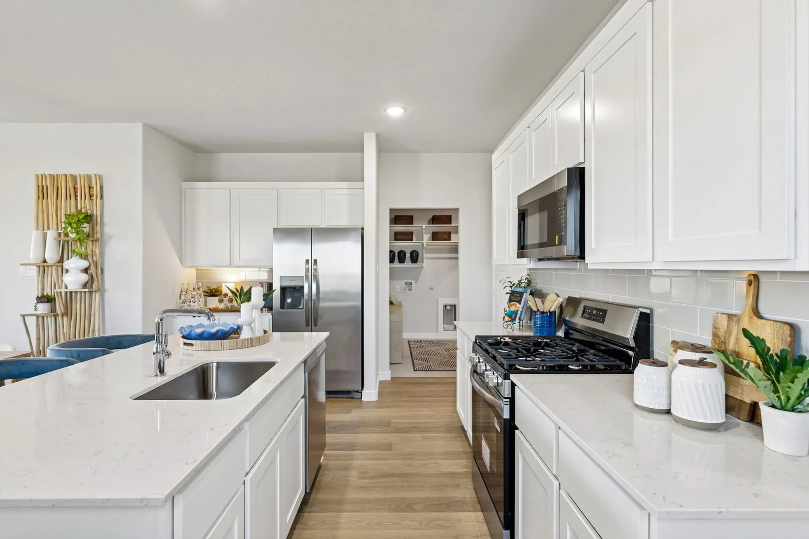 Kitchen in the Magnolia home plan by Trophy Signature Homes – REPRESENTATIVE PHOTO