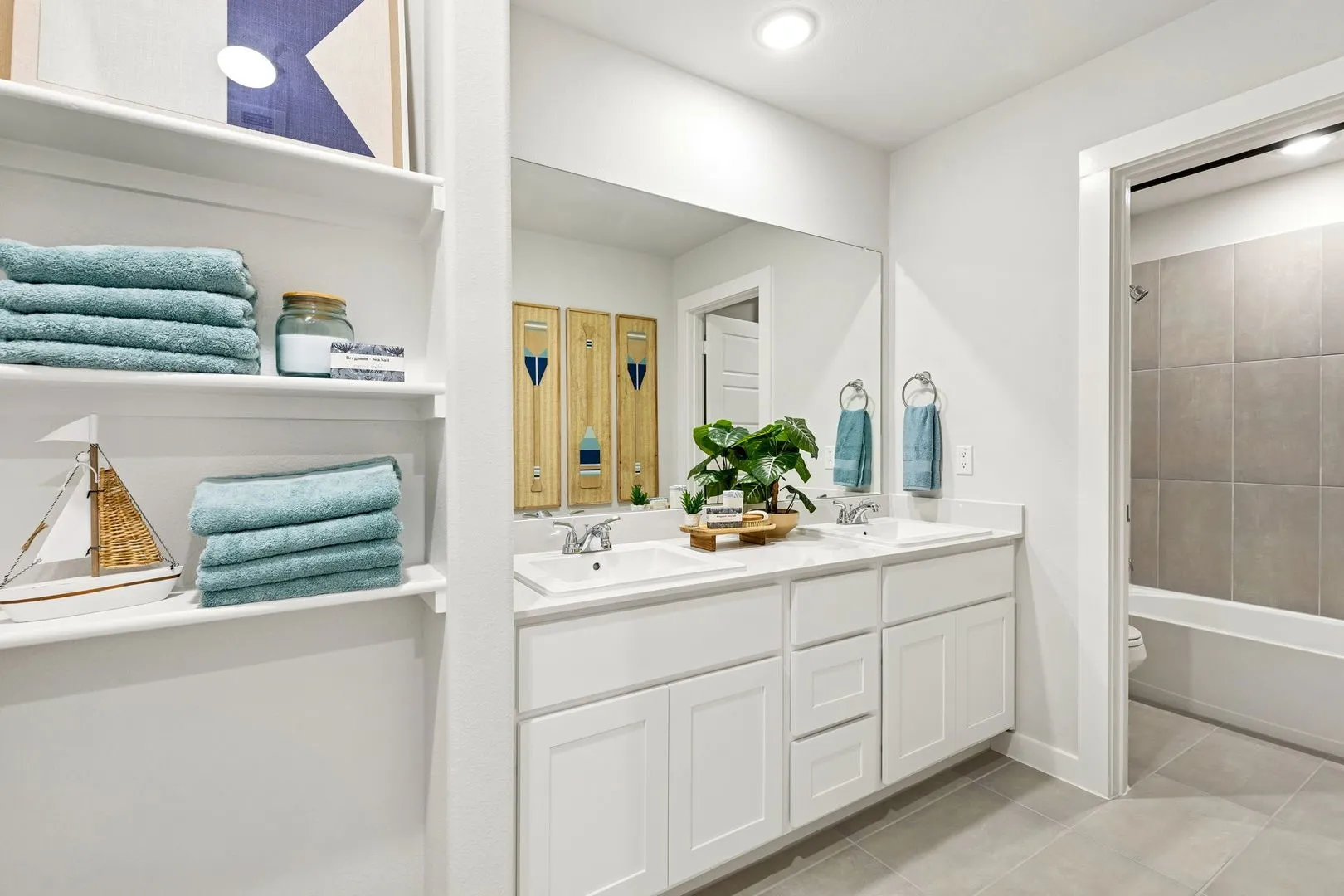 Secondary bathroom in the Magnolia home plan by Trophy Signature Homes – REPRESENTATIVE PHOTO