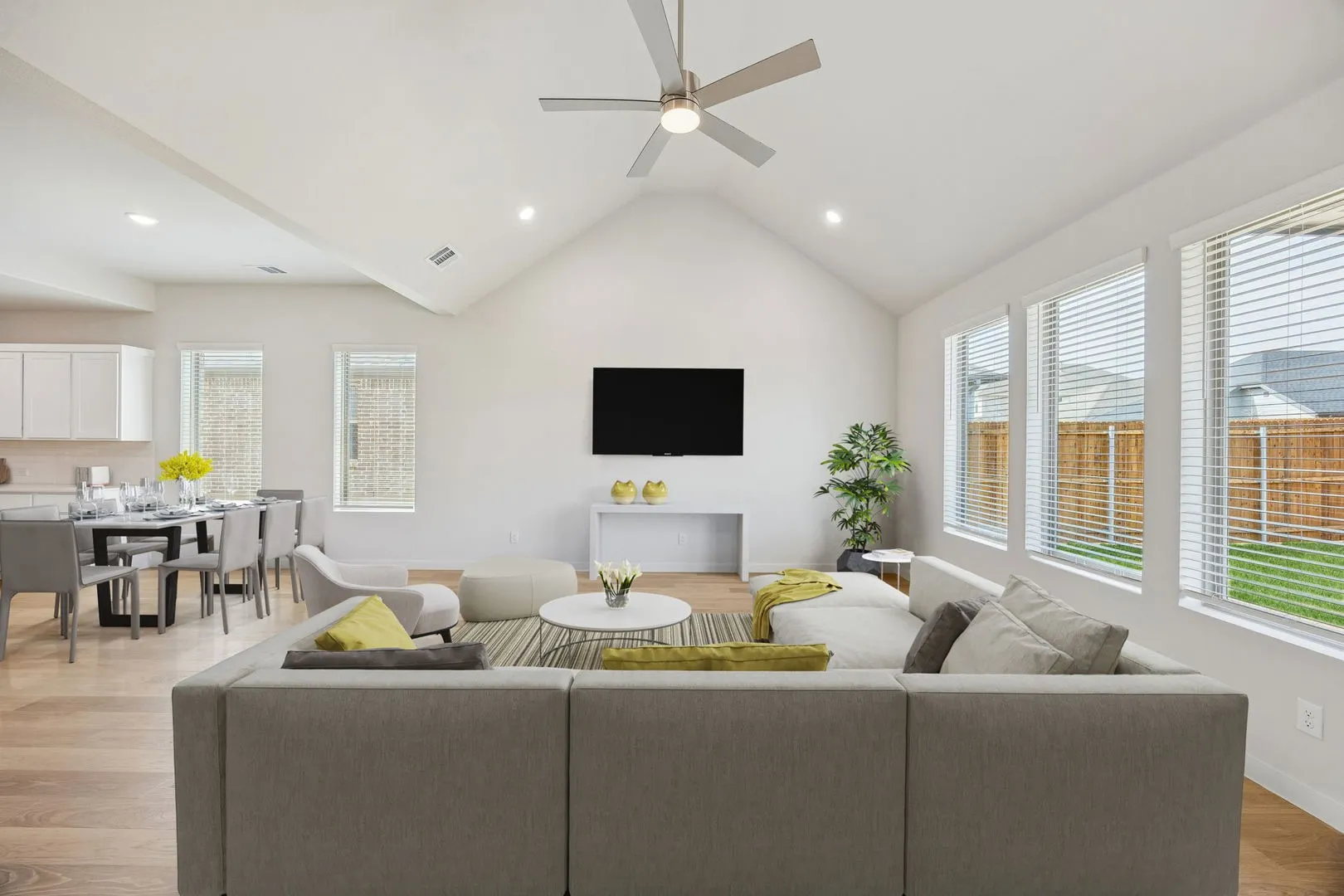 Living and Dining Room in the Stanley II home plan – REPRESENTATIVE PHO
