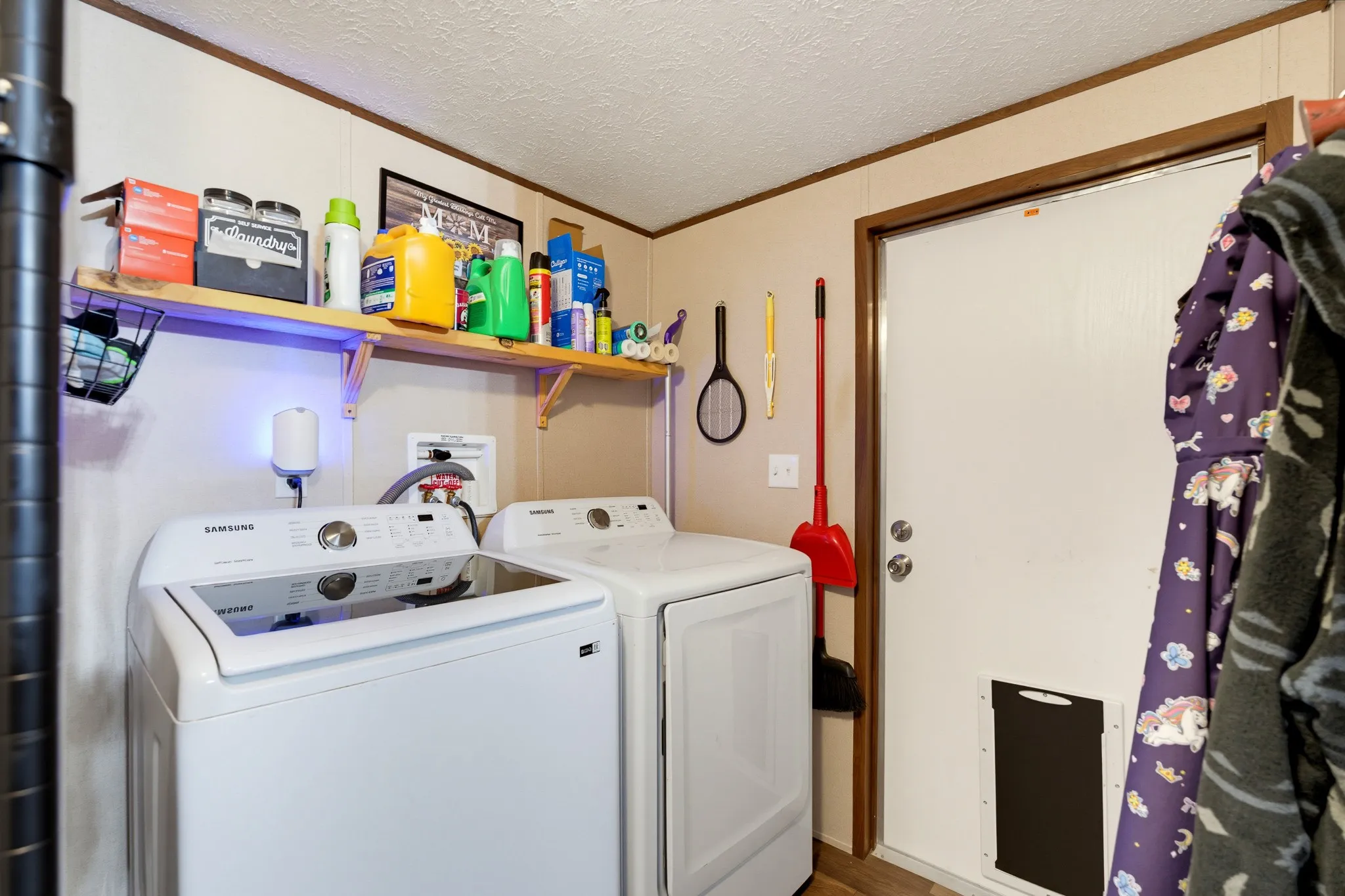 Laundry area with room for deep freezer