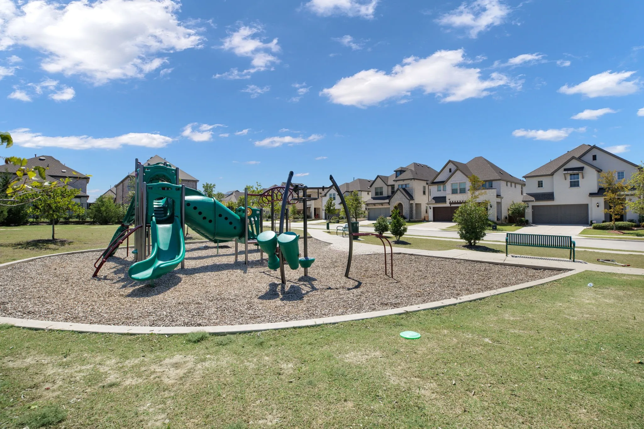Community playground located directly across the street from this home