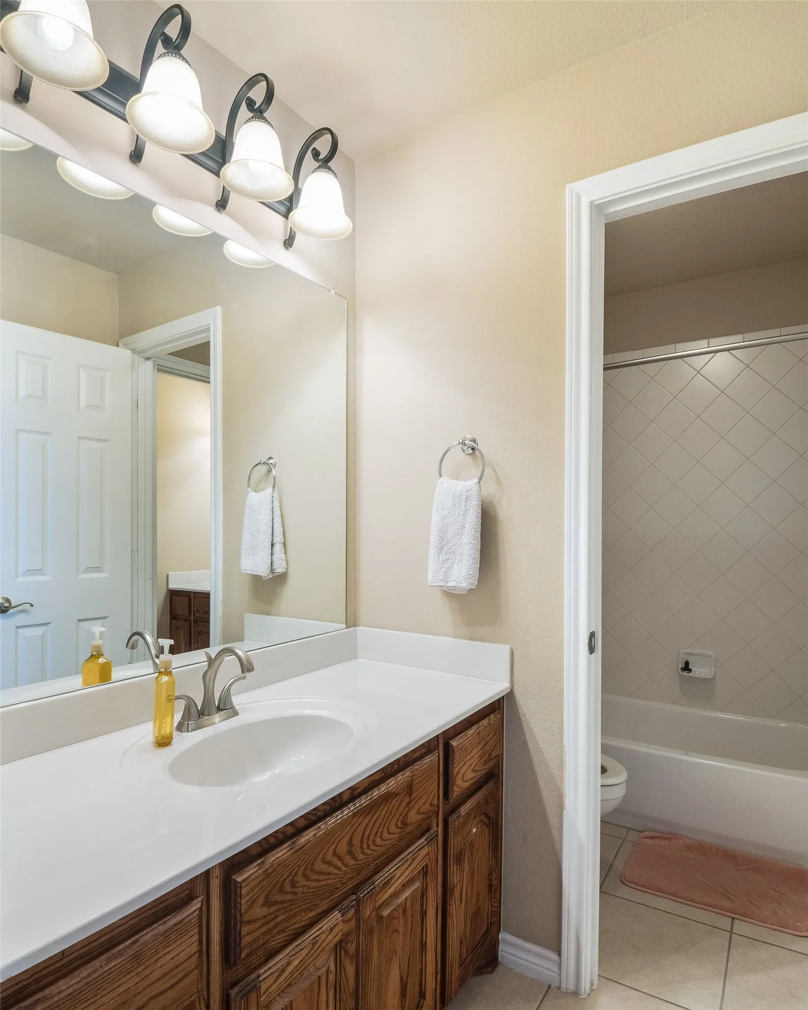 Jack and Jill bathroom located upstairs