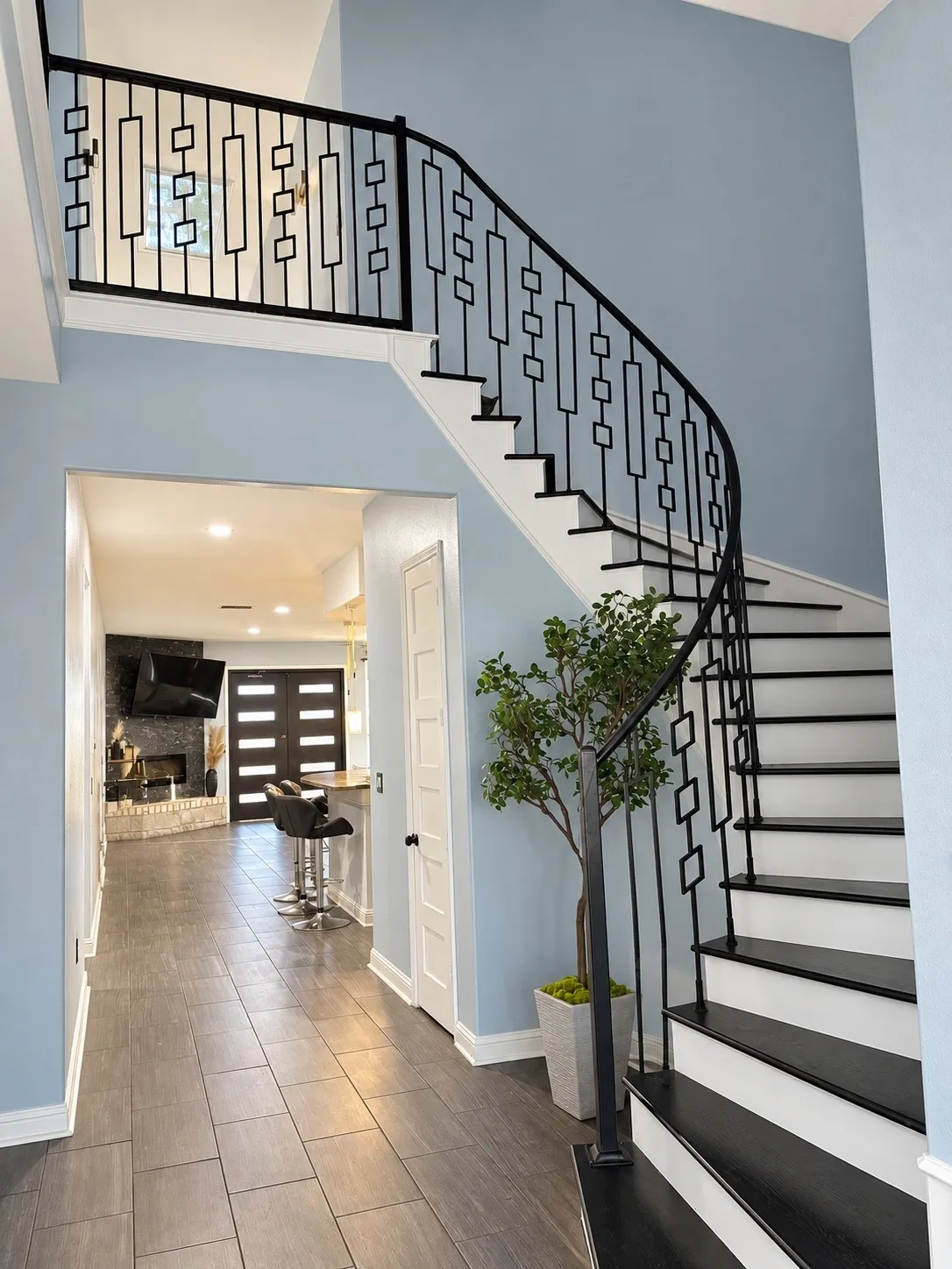 Sleek, modern stair railing with geometric balusters
