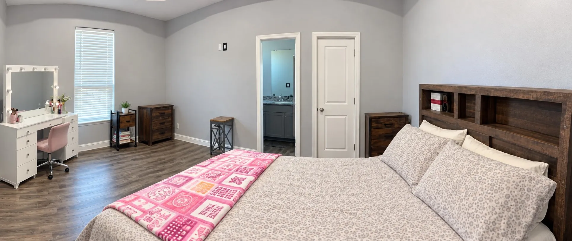 Wood-finish flooring with light gray walls