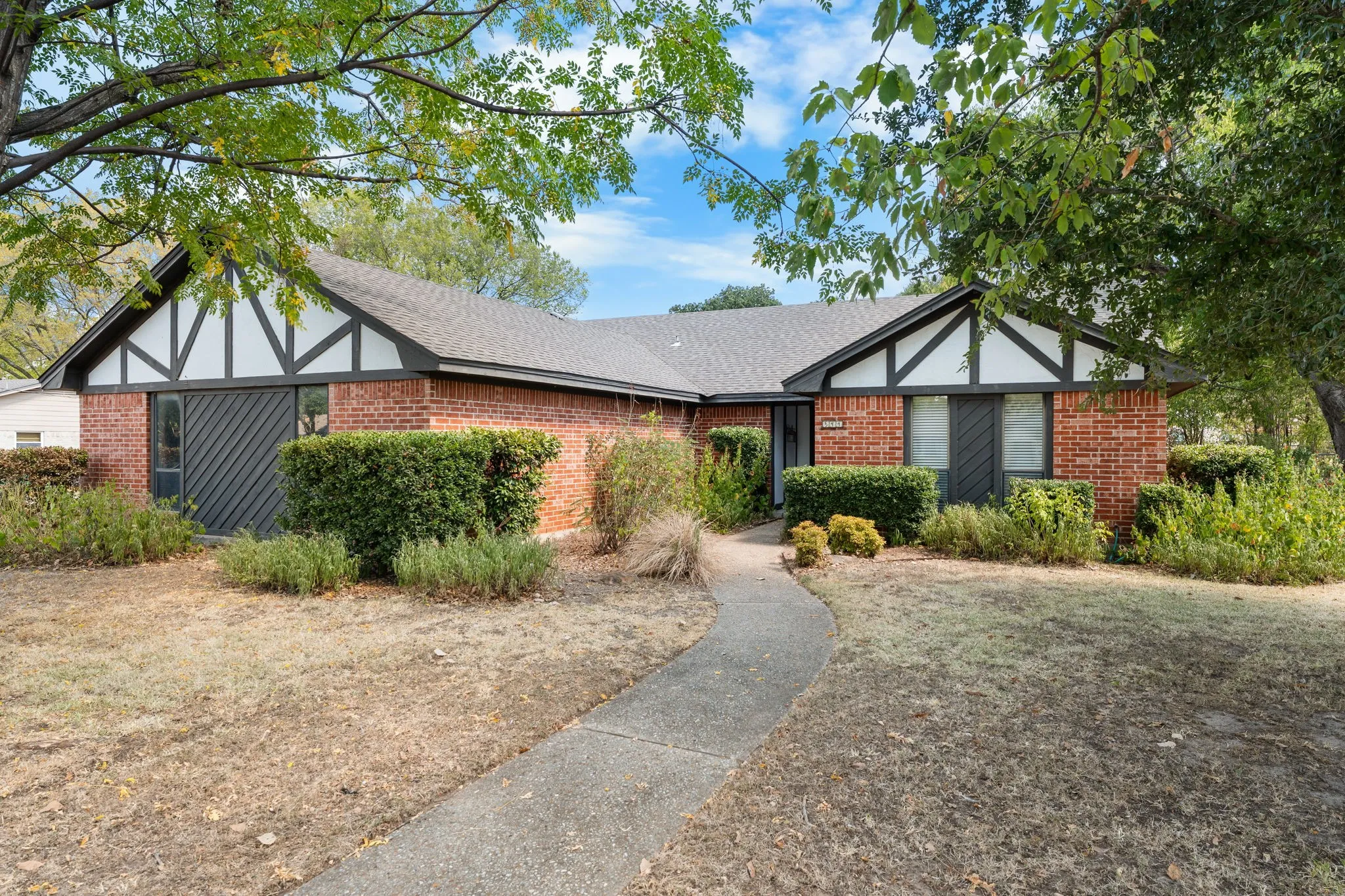 Brick exterior with Tudor-style gables