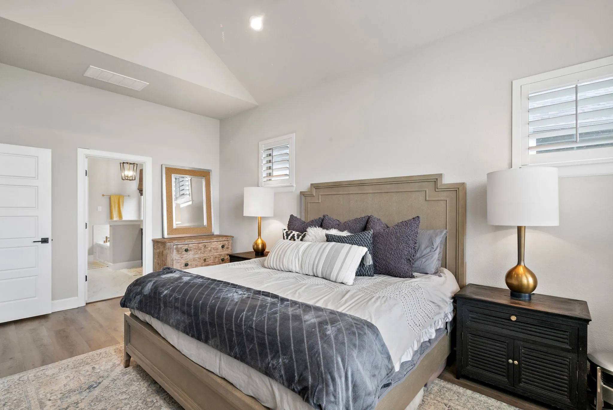 Vaulted ceiling and wood-finish flooring