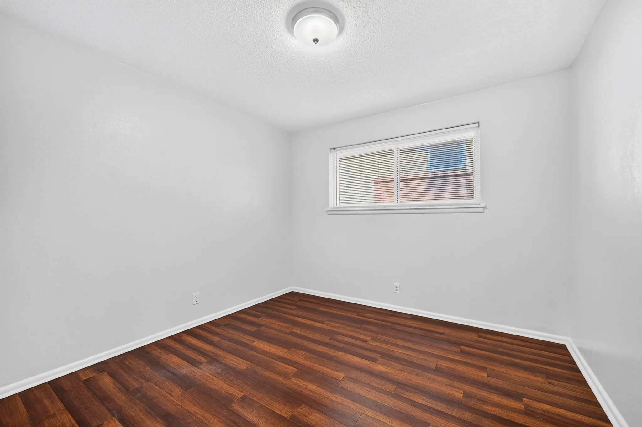 Wood-finish flooring with white trim