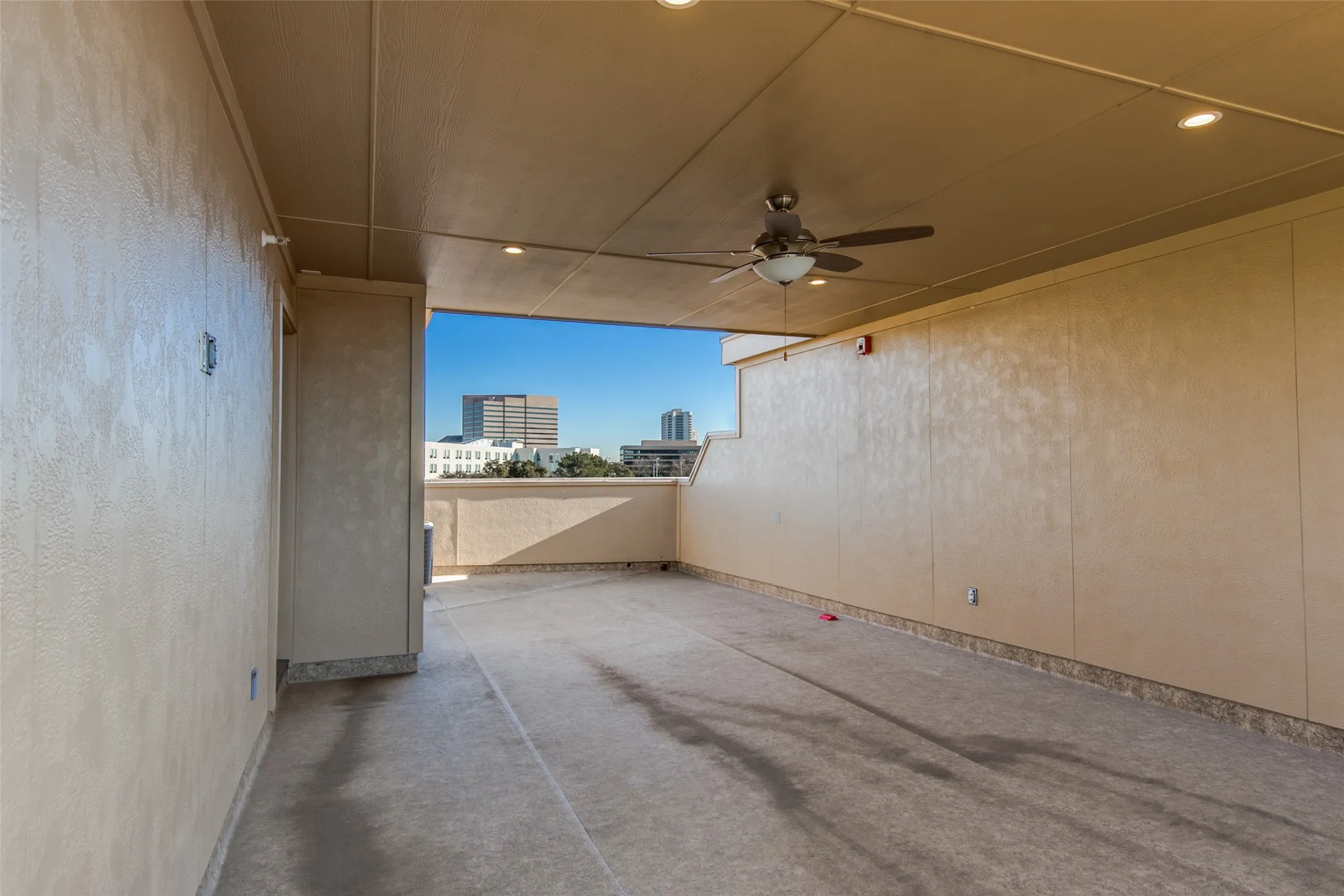 Partially covered rooftop deck