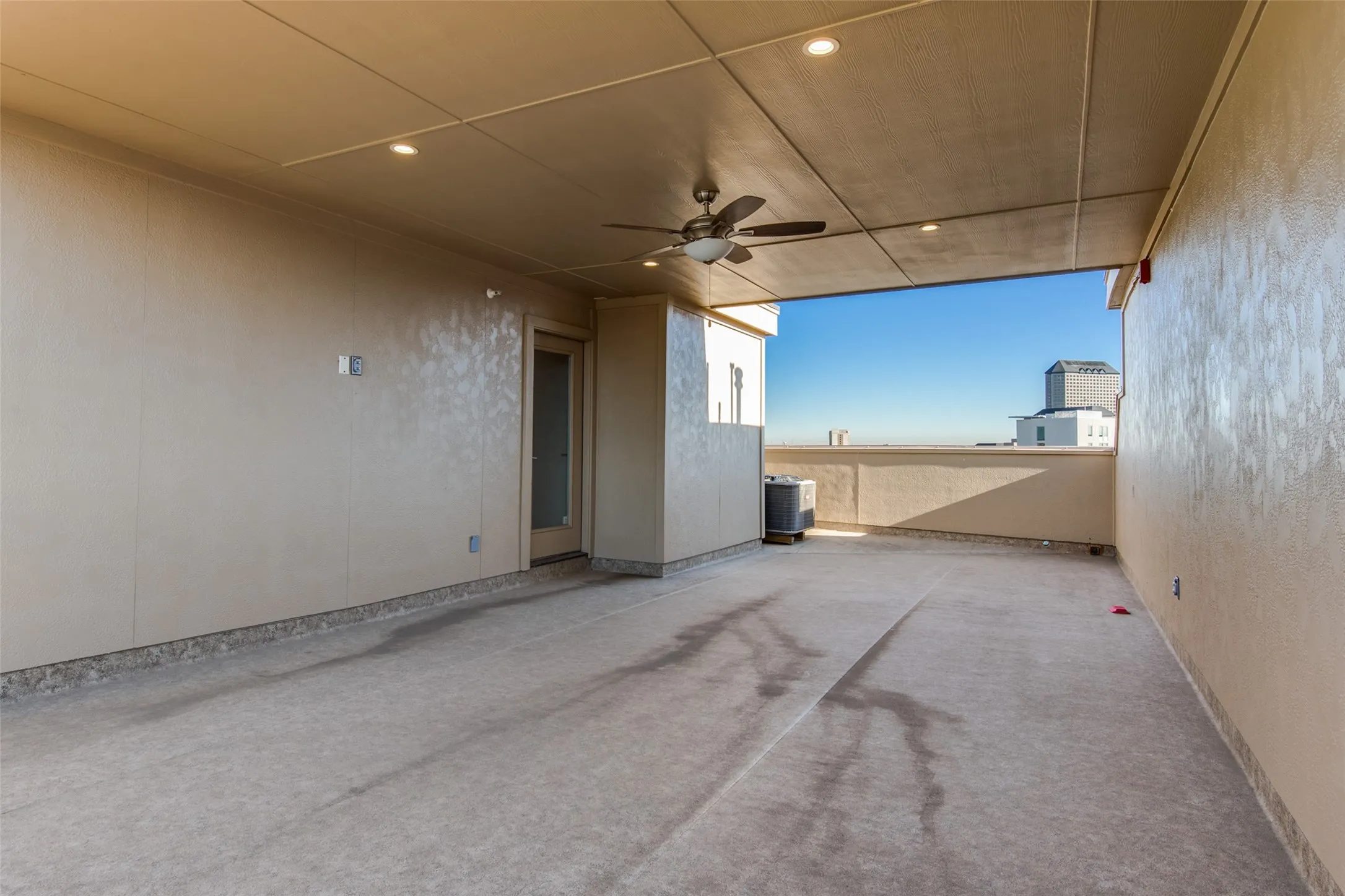 Partially covered rooftop deck