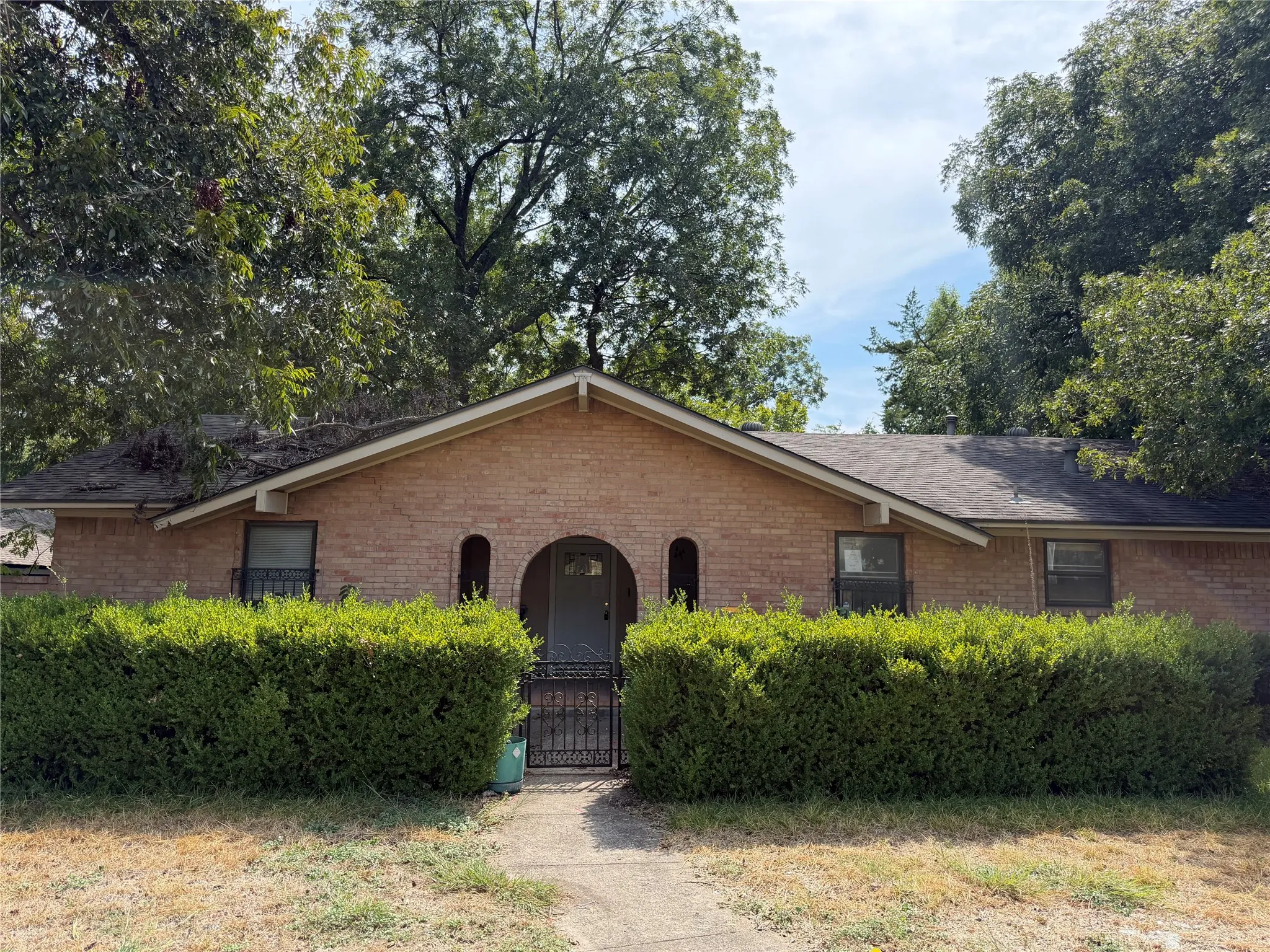Brick exterior with a gabled roofline