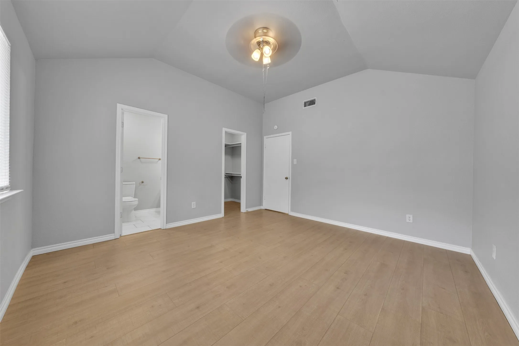 Vaulted ceiling with a flush-mount light fixture
