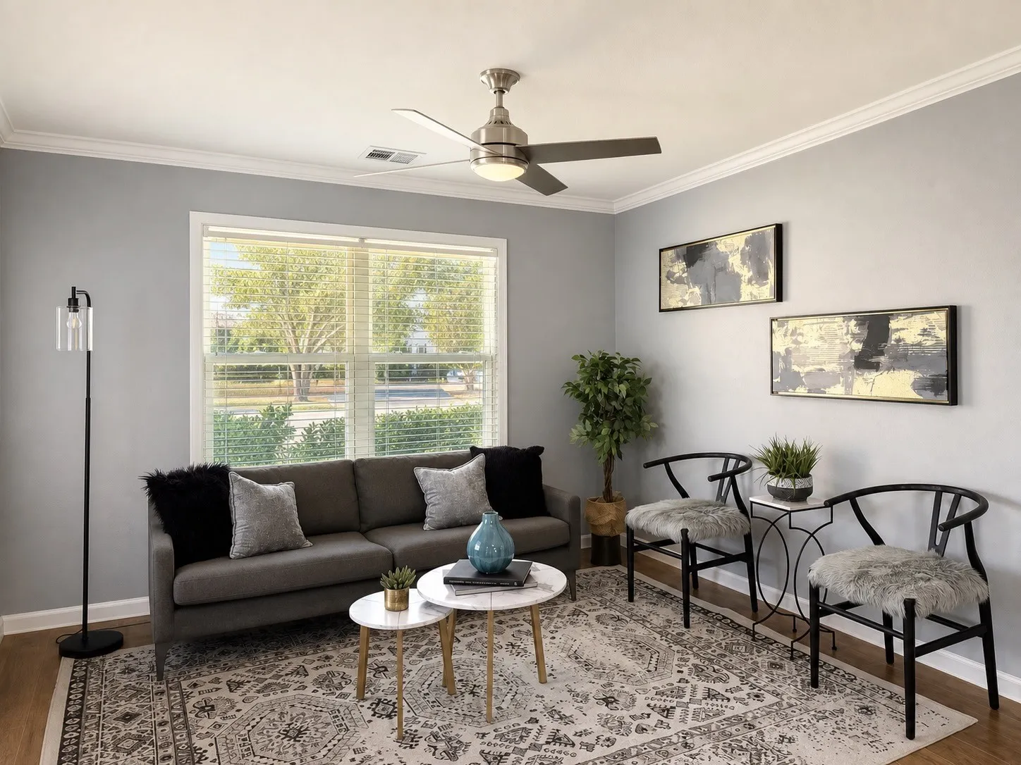 Recessed lighting, crown molding, wood-finish flooring, and a ceiling fan with integrated lighting