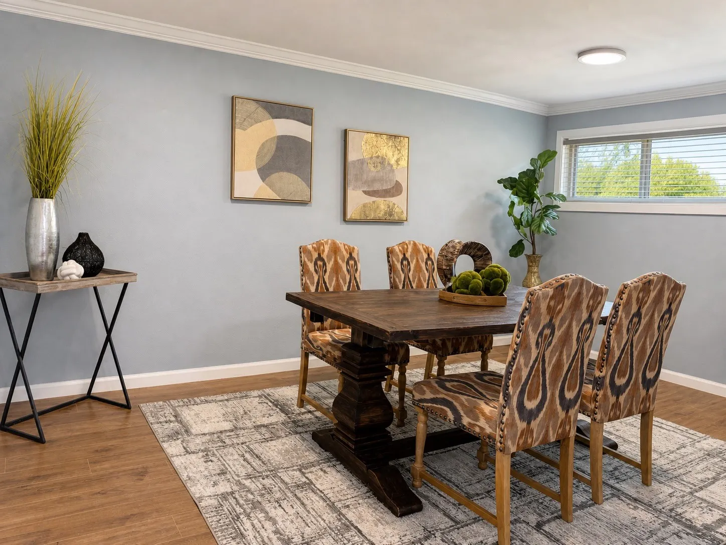 Crown molding, wood-finish flooring, and recessed lighting