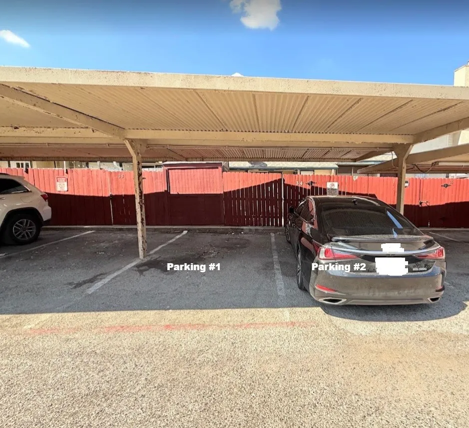 Park in 2-covered carport #24-see fence gate
