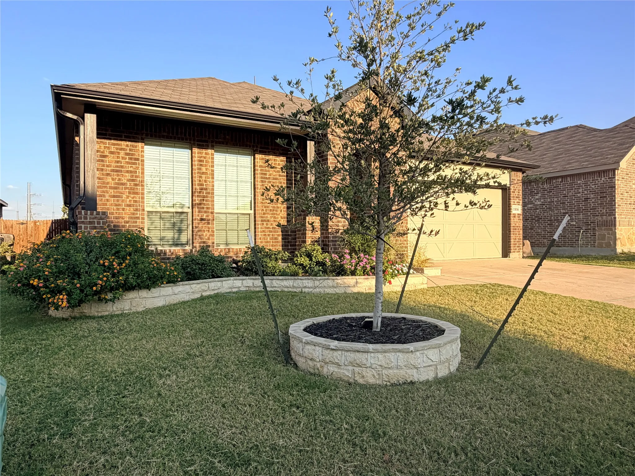Brick exterior with a covered entry