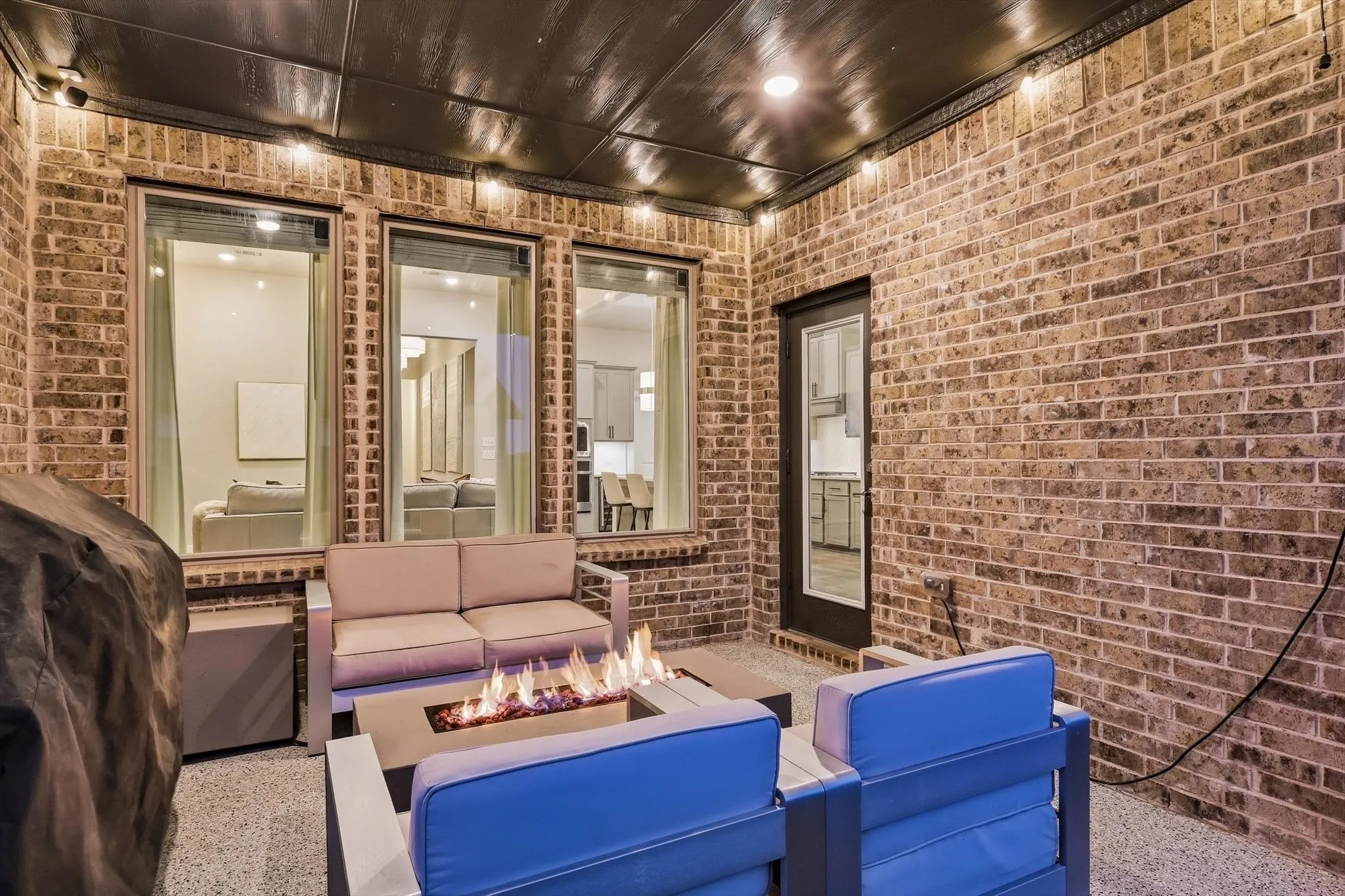 Cozy back patio great for relaxing and entertaining with no north side neighbors.