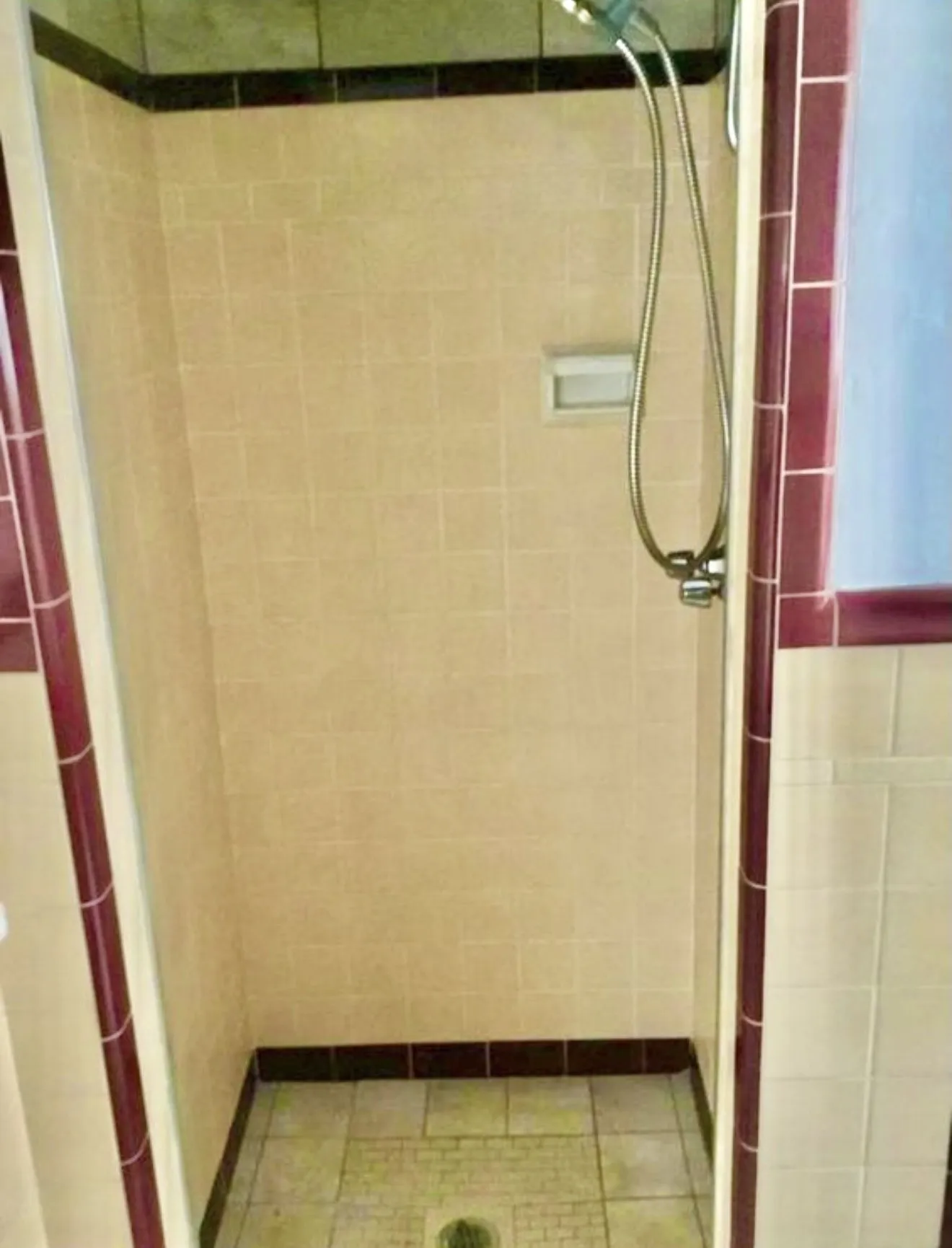 Separate tiled shower.