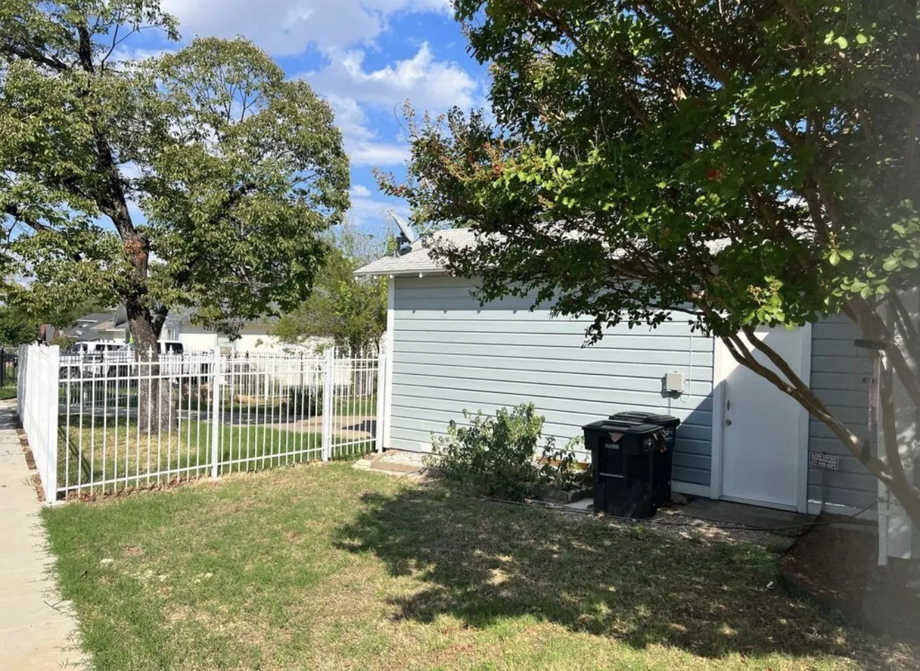 West side of attached garage with additional exit.
