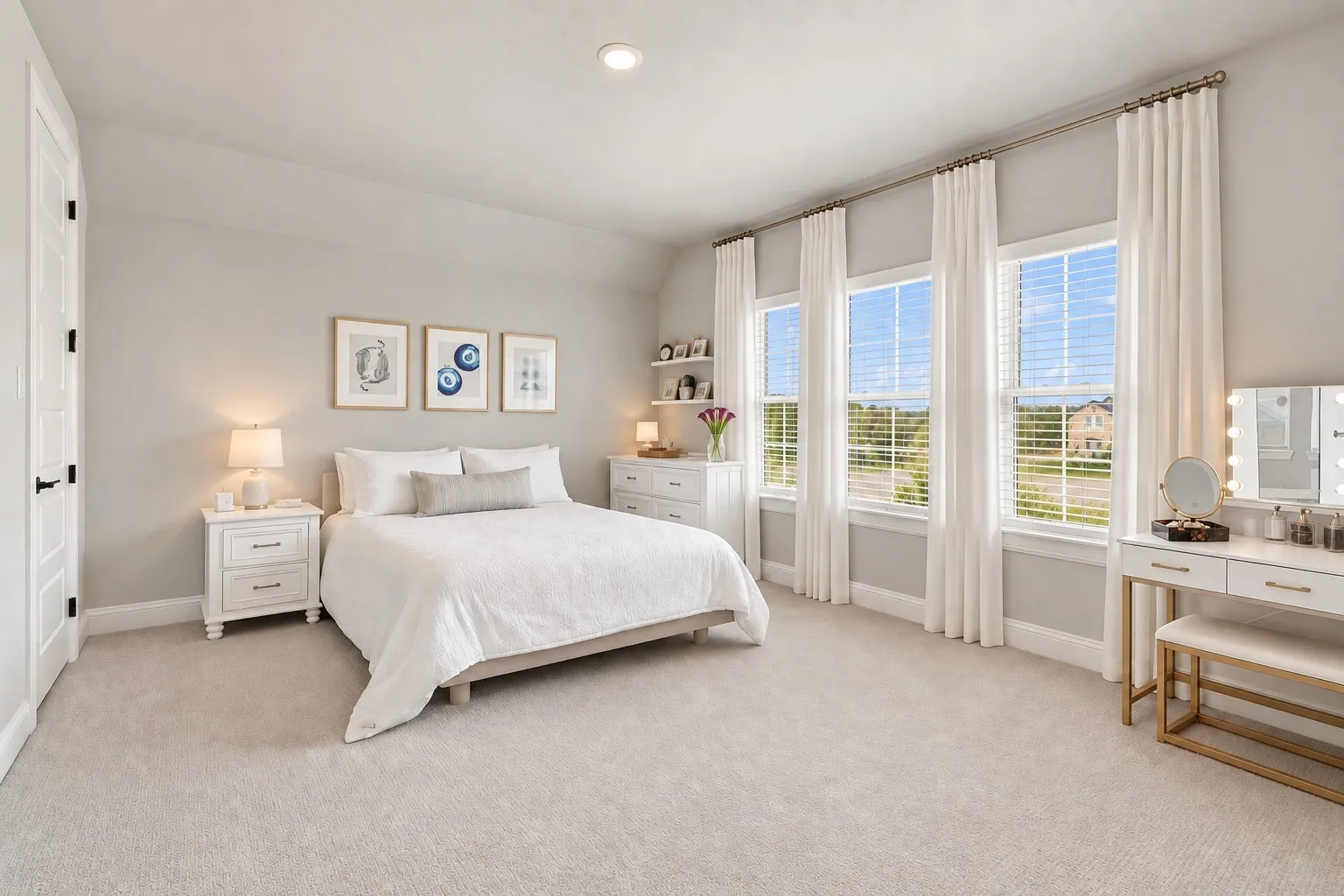 Plush carpeted flooring, three large windows, recessed ceiling lighting, and a white paneled door with black hardware
