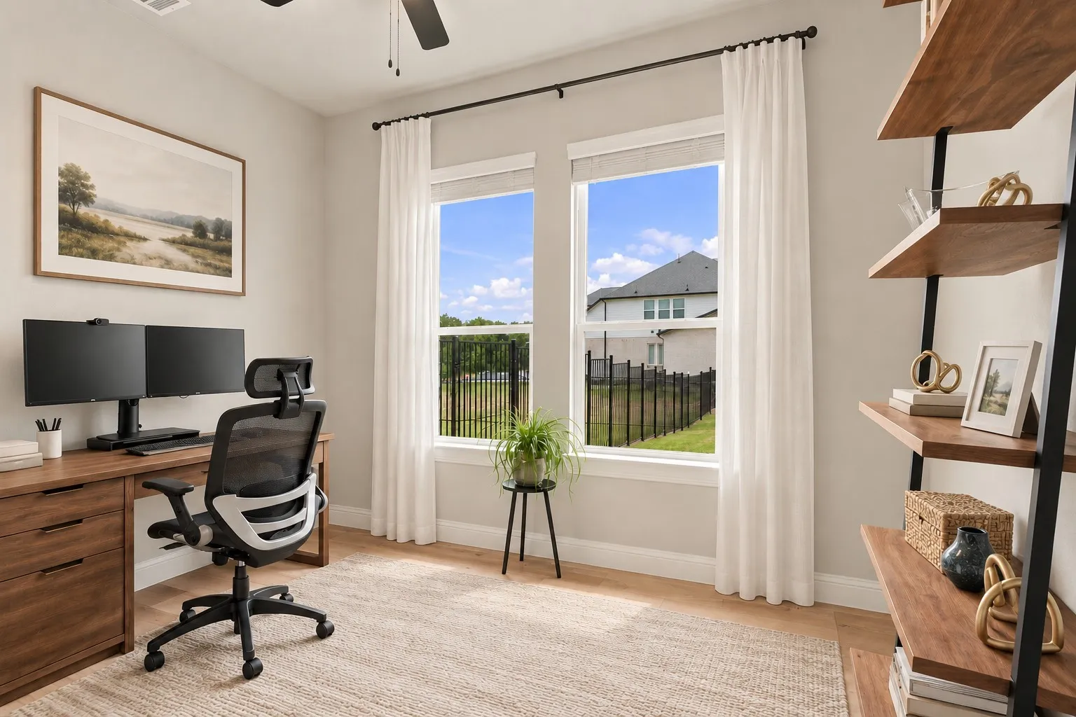 Dual windows with white trim, wood-finish flooring, a ceiling fan, and wall-mounted shelving