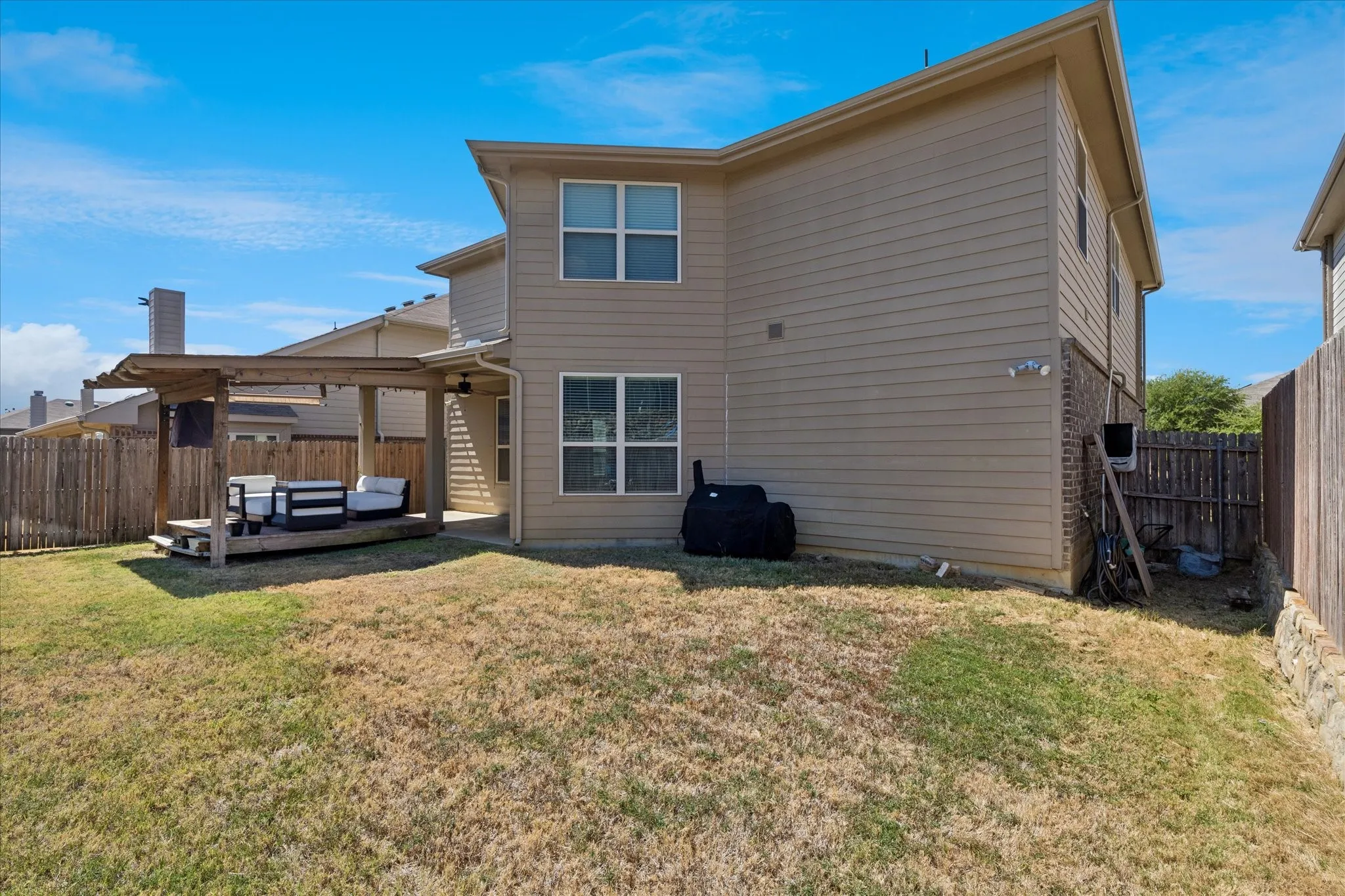 Spacious backyard!  10x10 covered patio that is east facing so you can enjoy the weather year round!