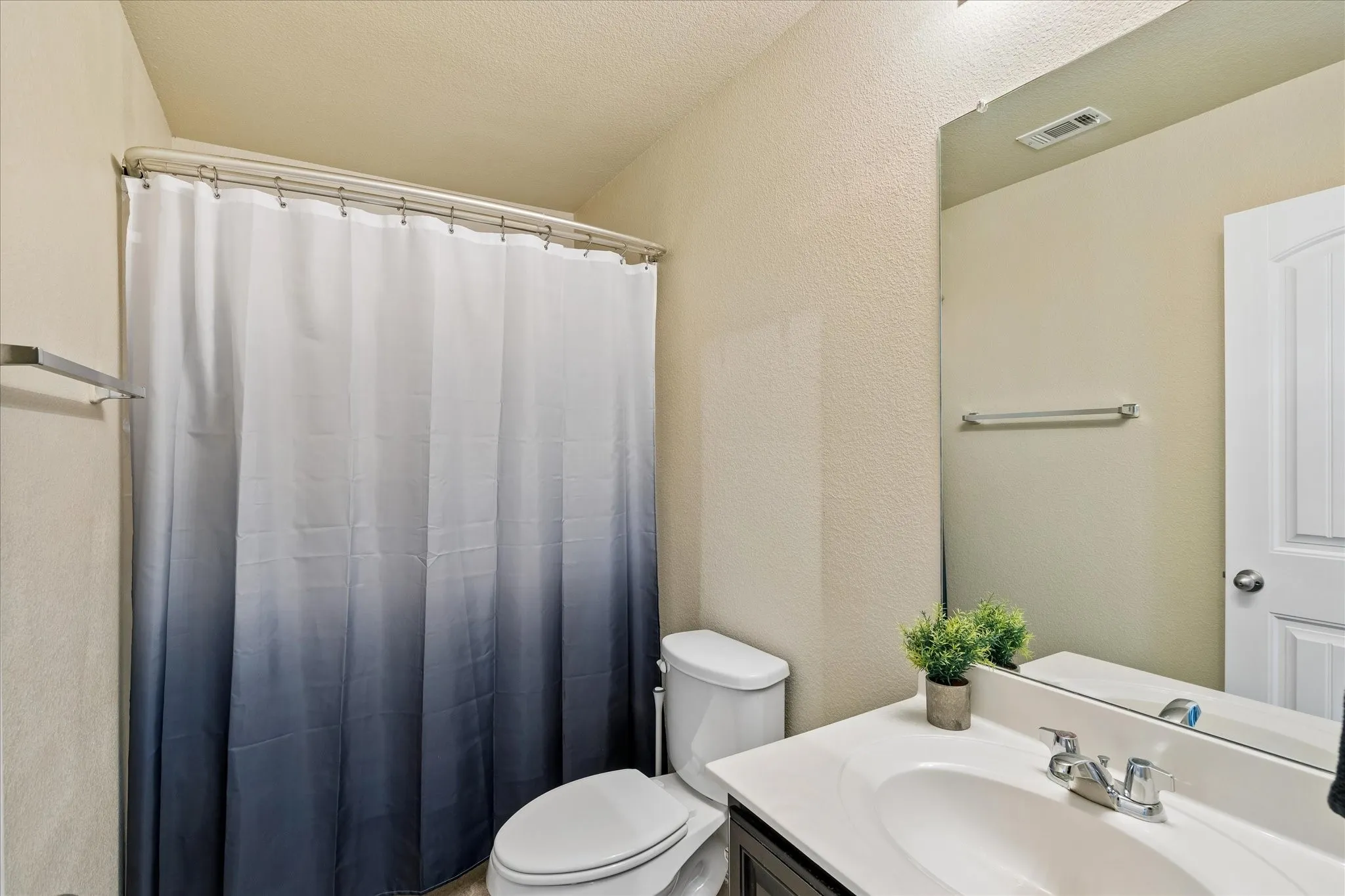 Secondary bath upstairs.
