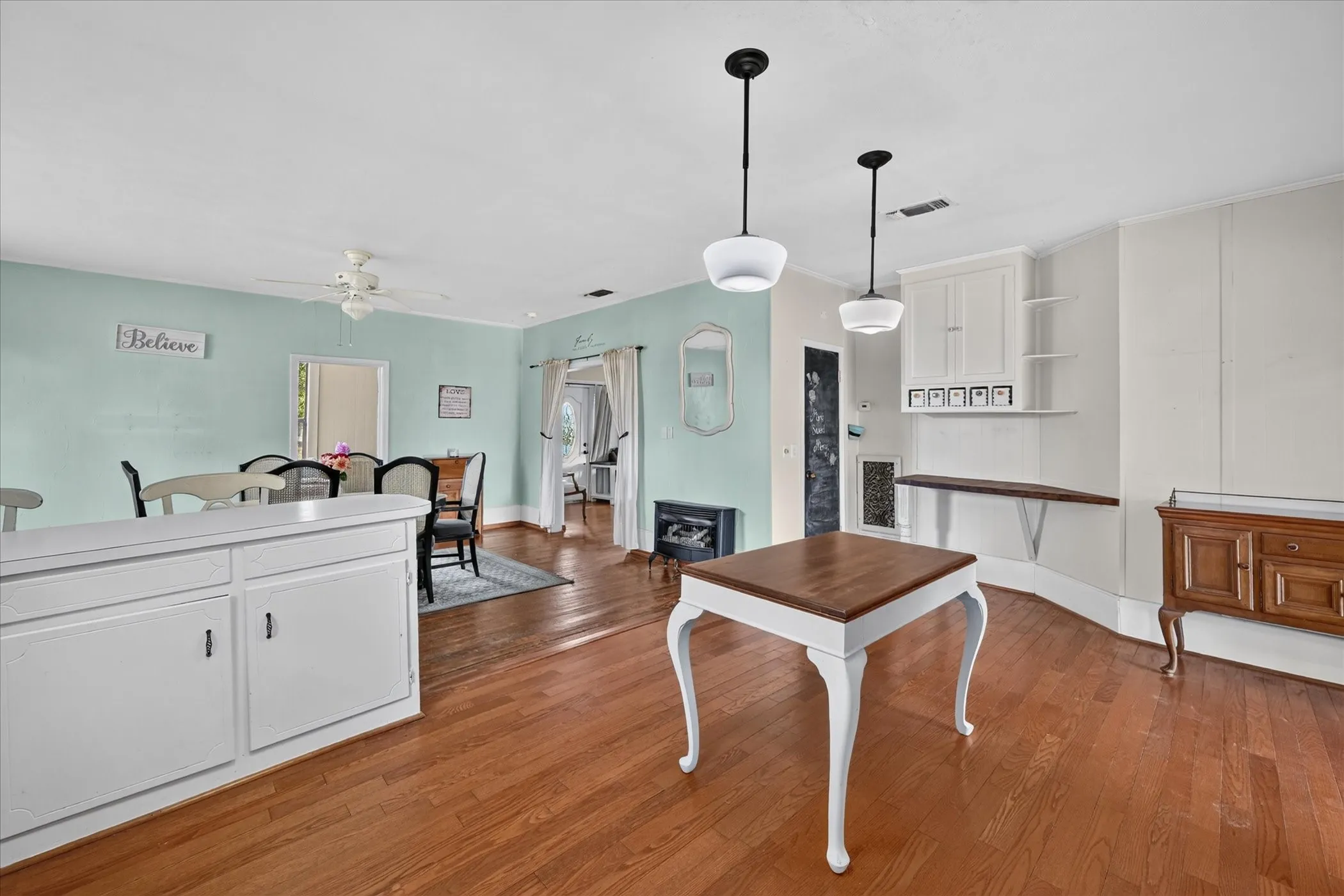 Hardwood-style flooring throughout