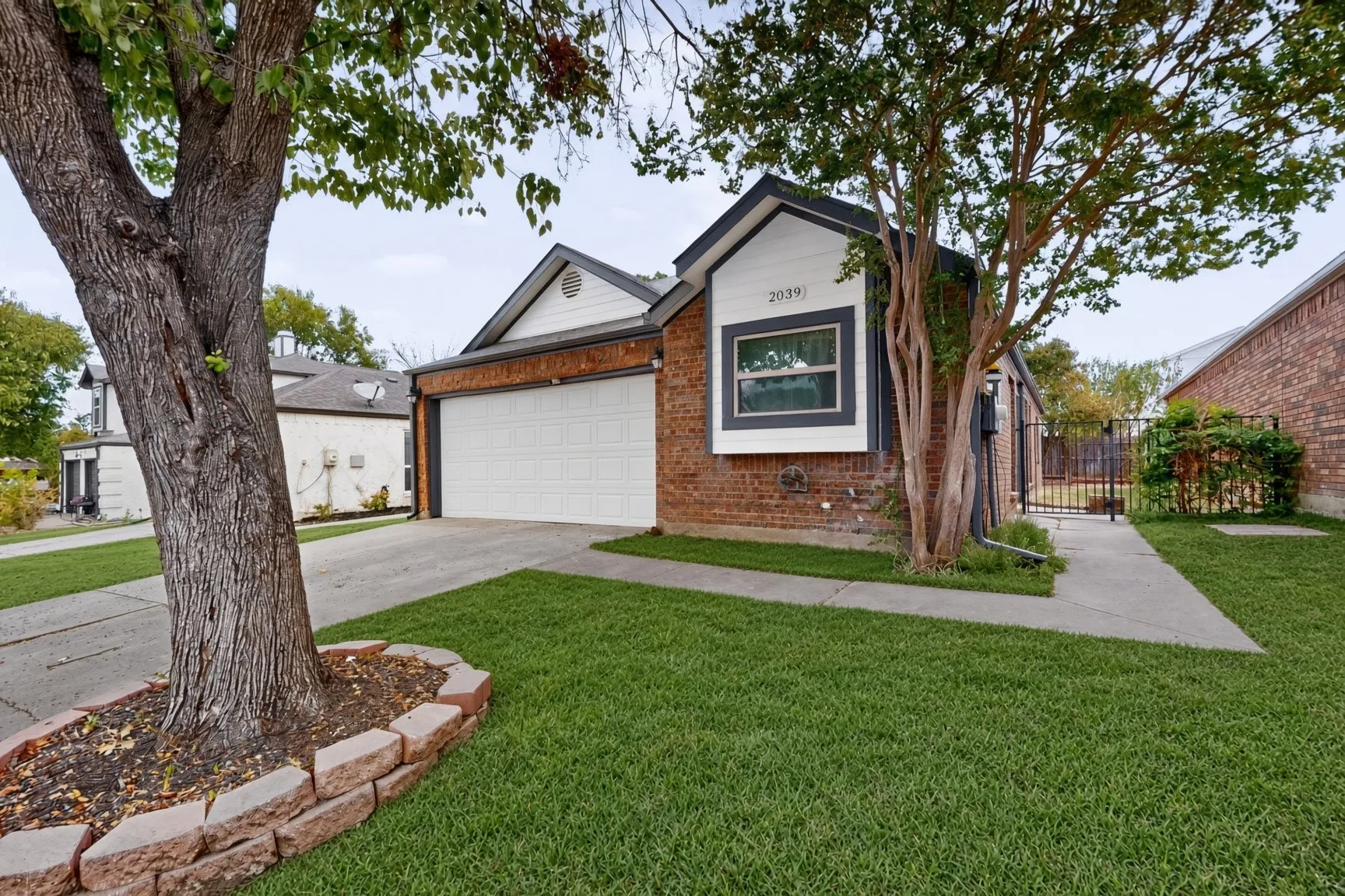 Brick exterior with white siding accents - AI enhanced