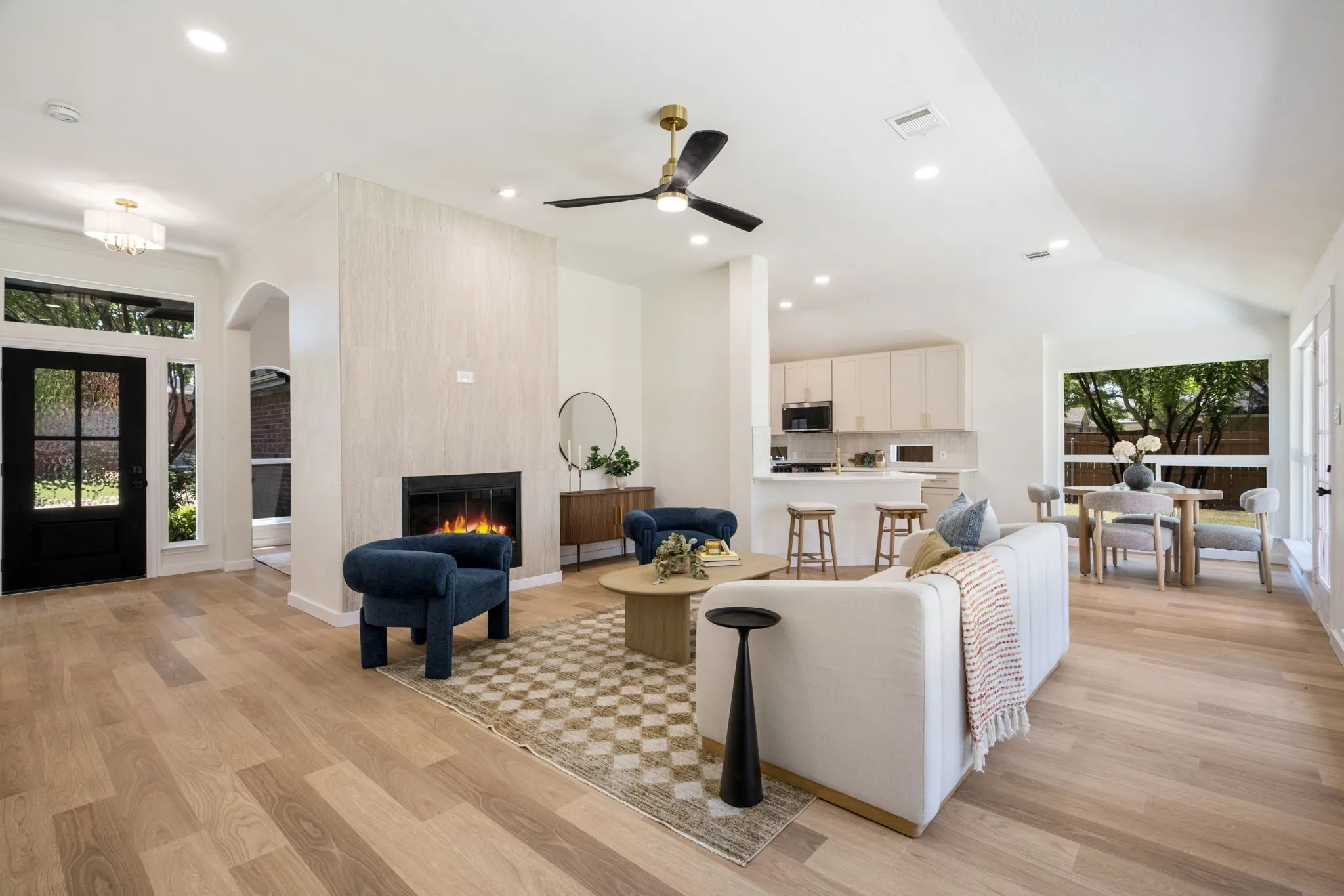 Wood-finish flooring throughout the space