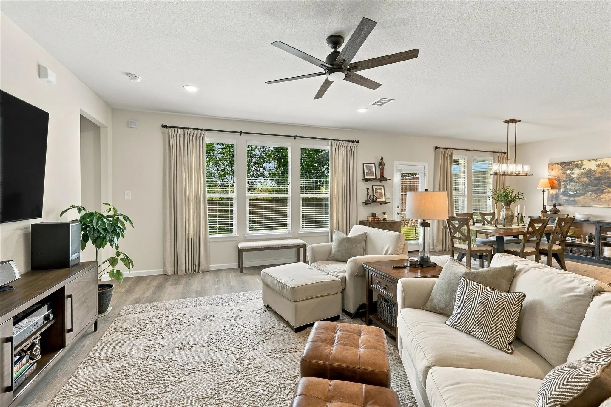 Designed for gathering, this impressive open-concept layout brings the living room, dining area and kitchen together in one bright, beautifully connected space.
