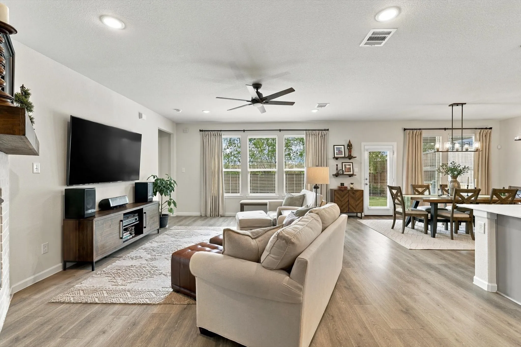 This is the heart of the home—a bright, expansive open-concept living space designed for effortless everyday living and unforgettable entertaining.